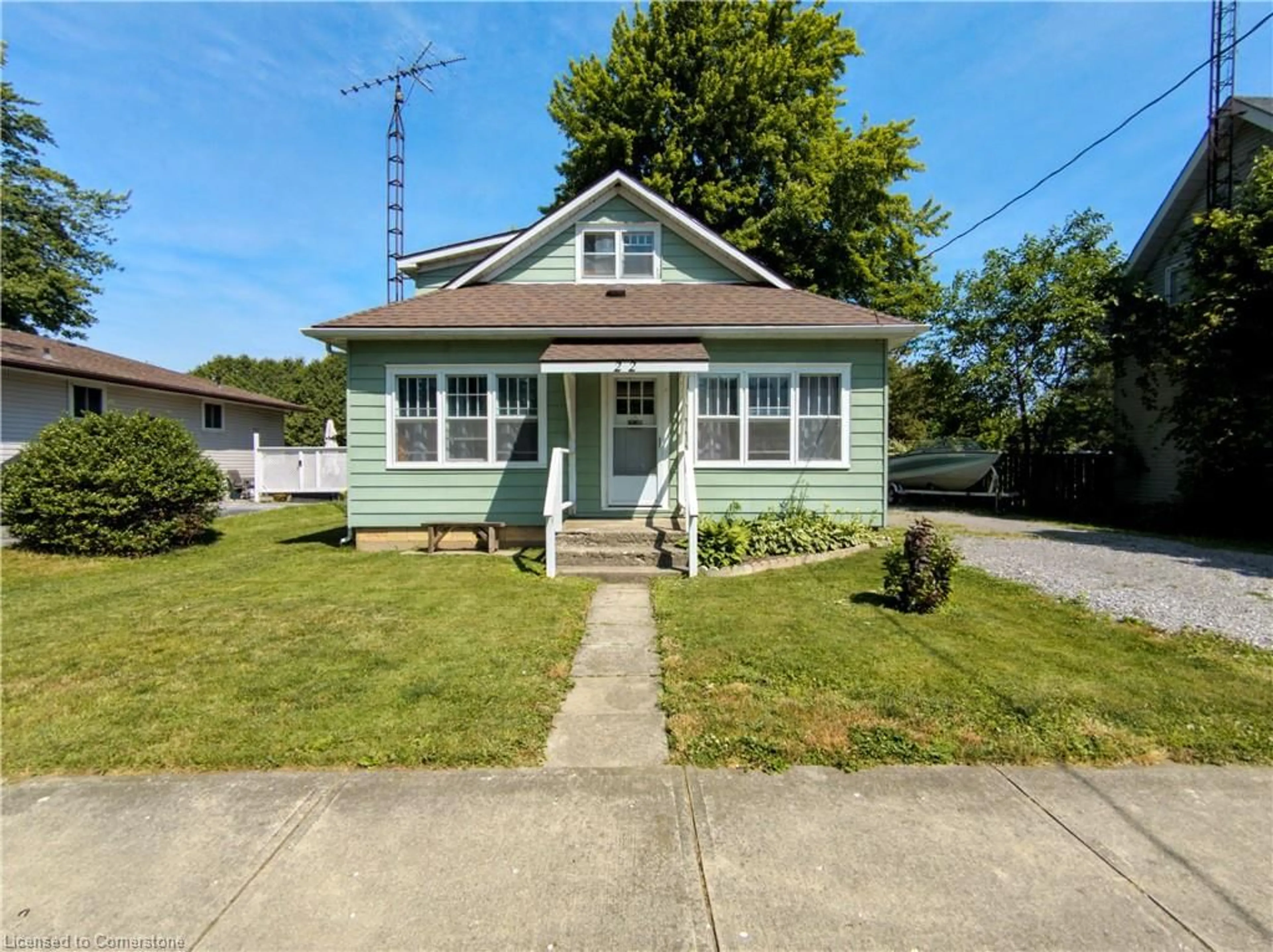 A pic from outside/outdoor area/front of a property/back of a property/a pic from drone, street for 22 Price St, Port Rowan Ontario N0E 1M0