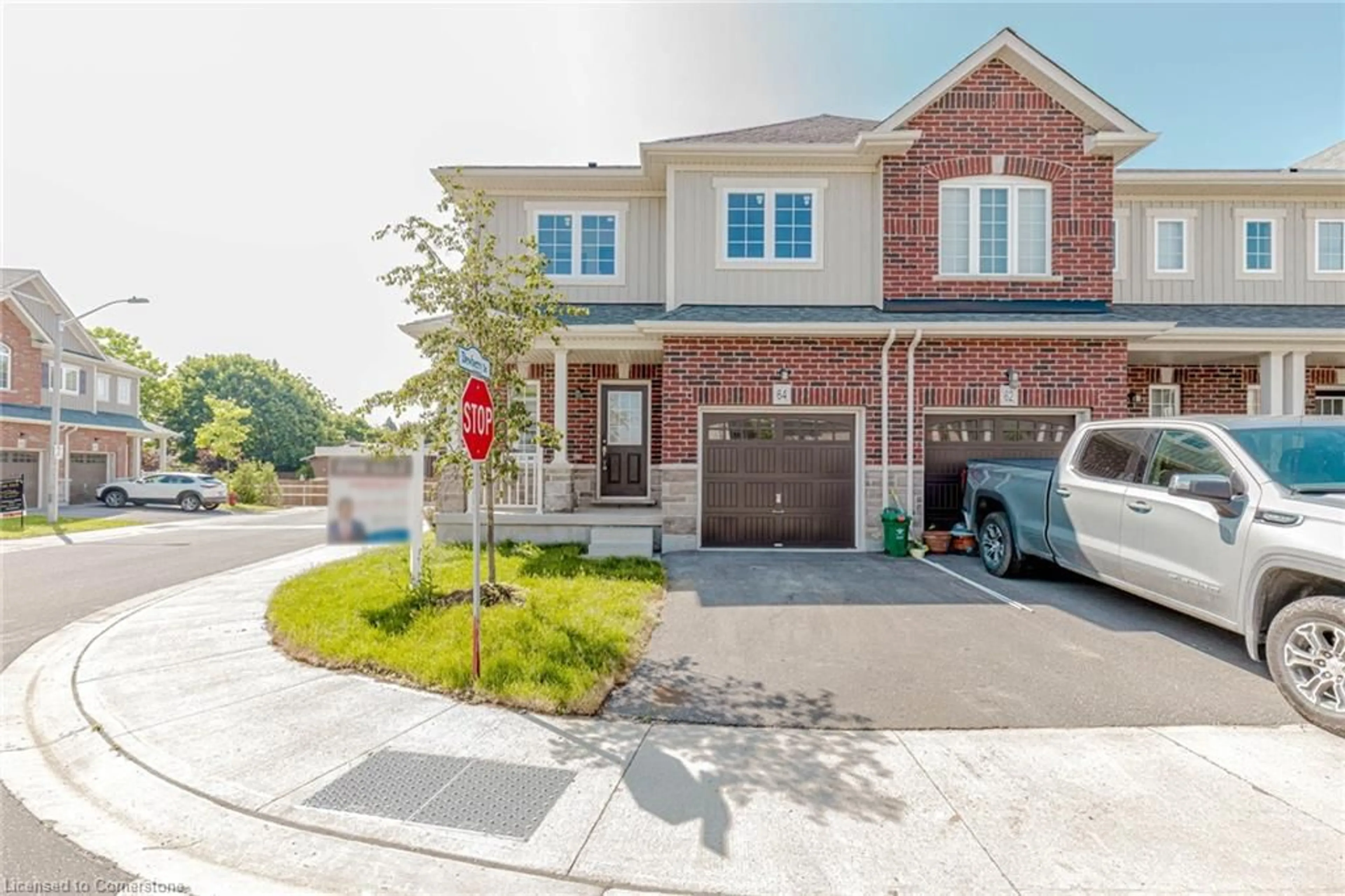 Home with brick exterior material, street for 64 Dewberry Dr, Kitchener Ontario N2B 0A9