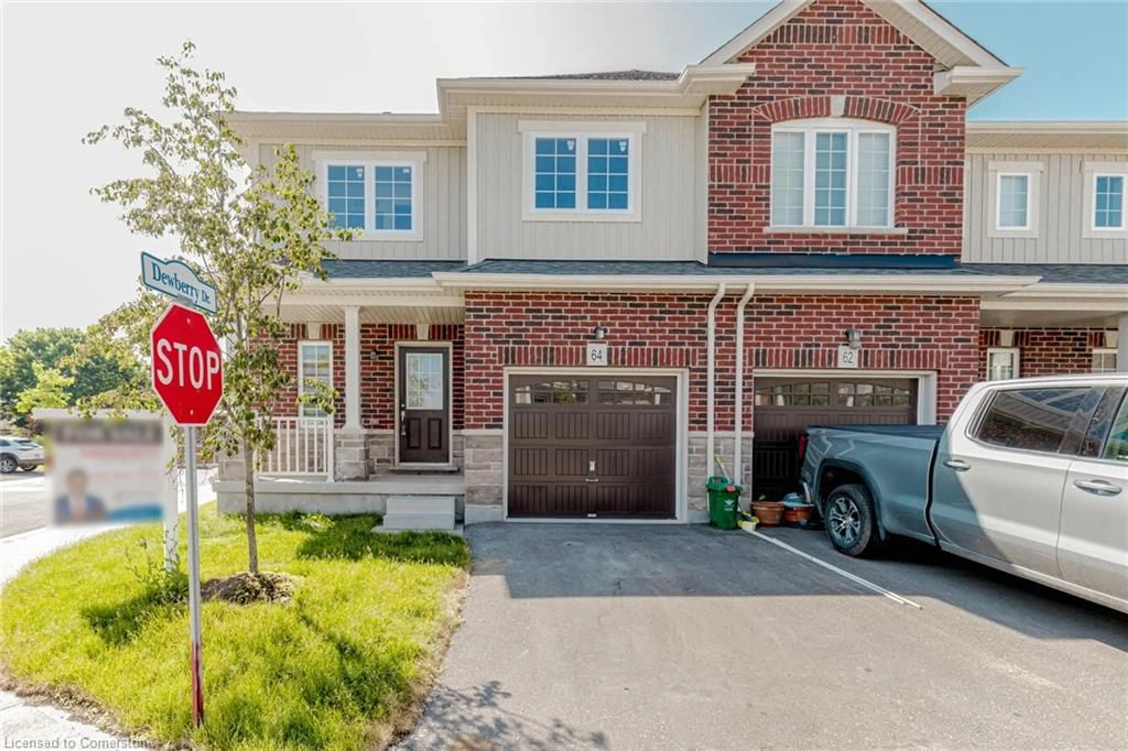 Home with brick exterior material, street for 64 Dewberry Dr, Kitchener Ontario N2B 0A9