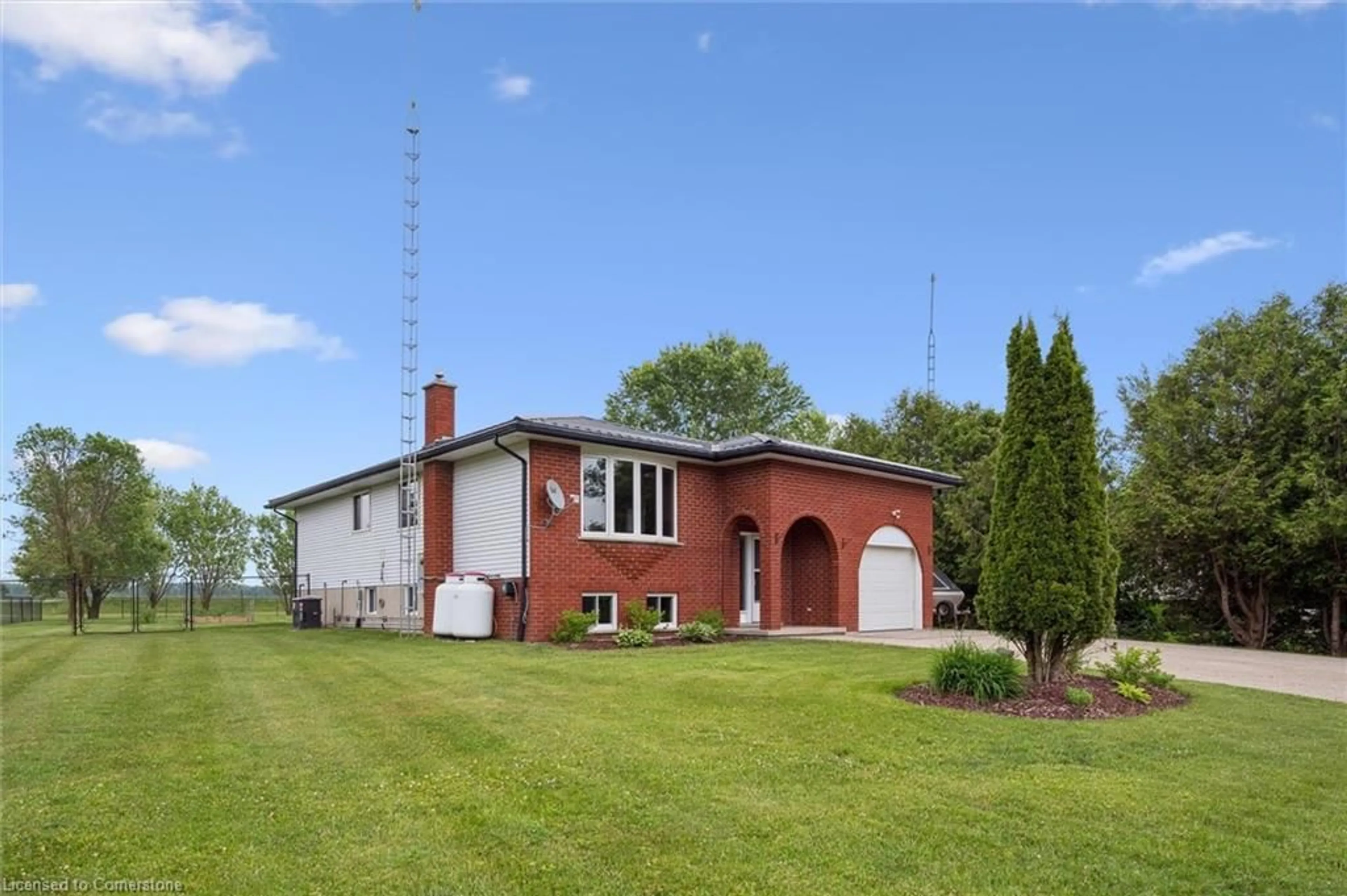 Home with brick exterior material, building for 9505 Maas Park Dr, Mount Forest Ontario N0G 2L0