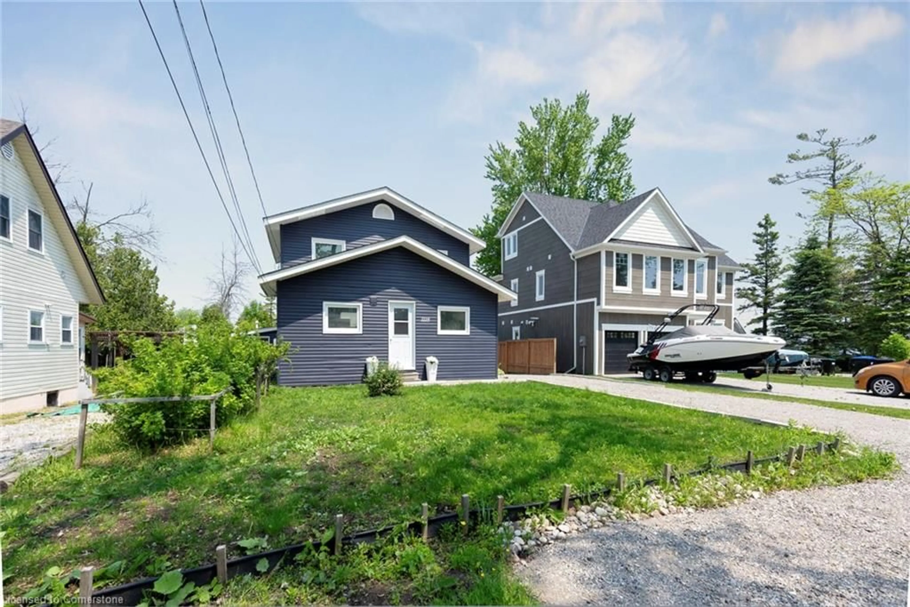 A pic from outside/outdoor area/front of a property/back of a property/a pic from drone, street for 1118 Stoney Point Rd, Innisfil Ontario L0L 1W0