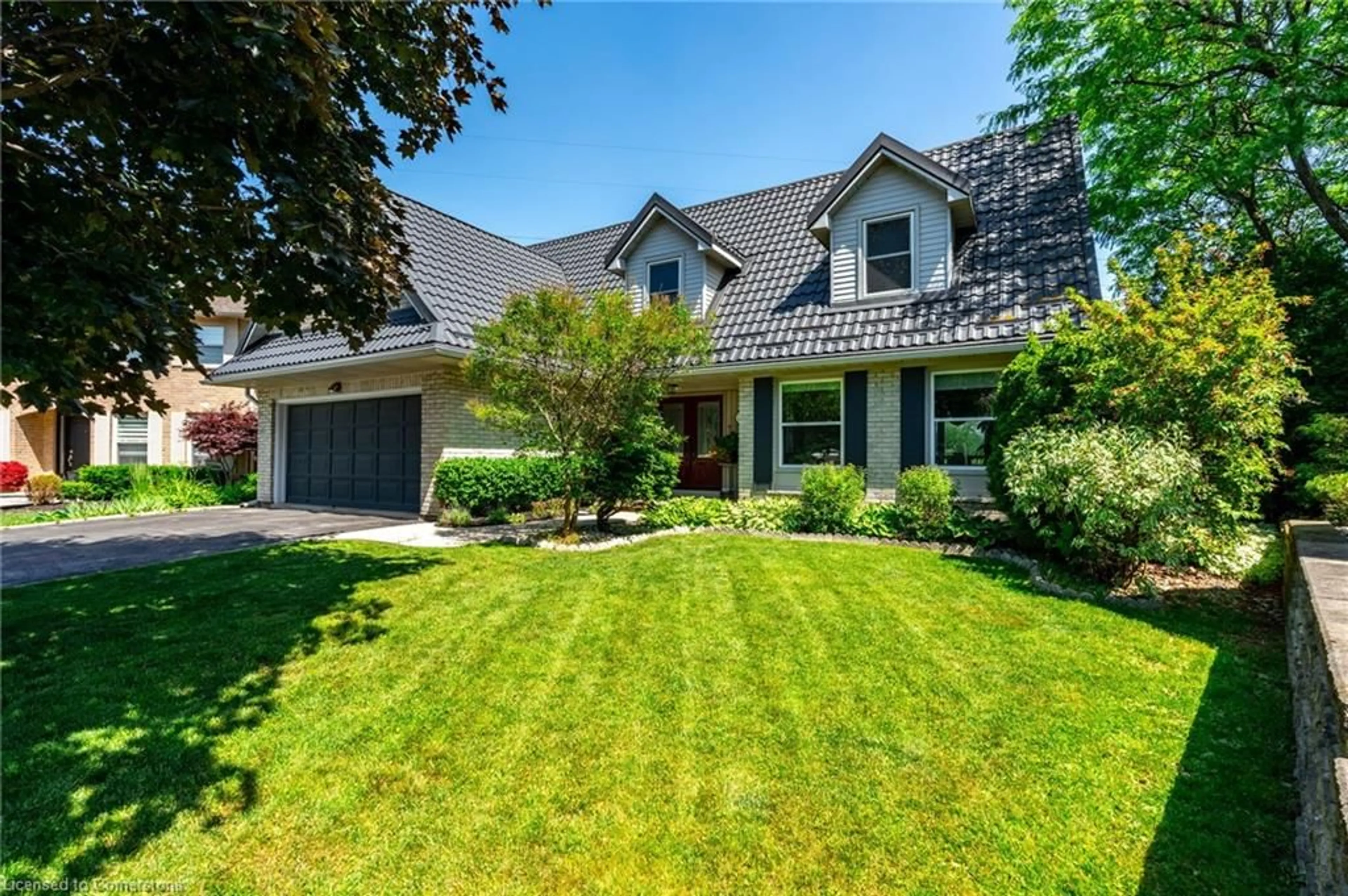 Home with vinyl exterior material, street for 16 Sunflower Cres, Ancaster Ontario L9K 1C2