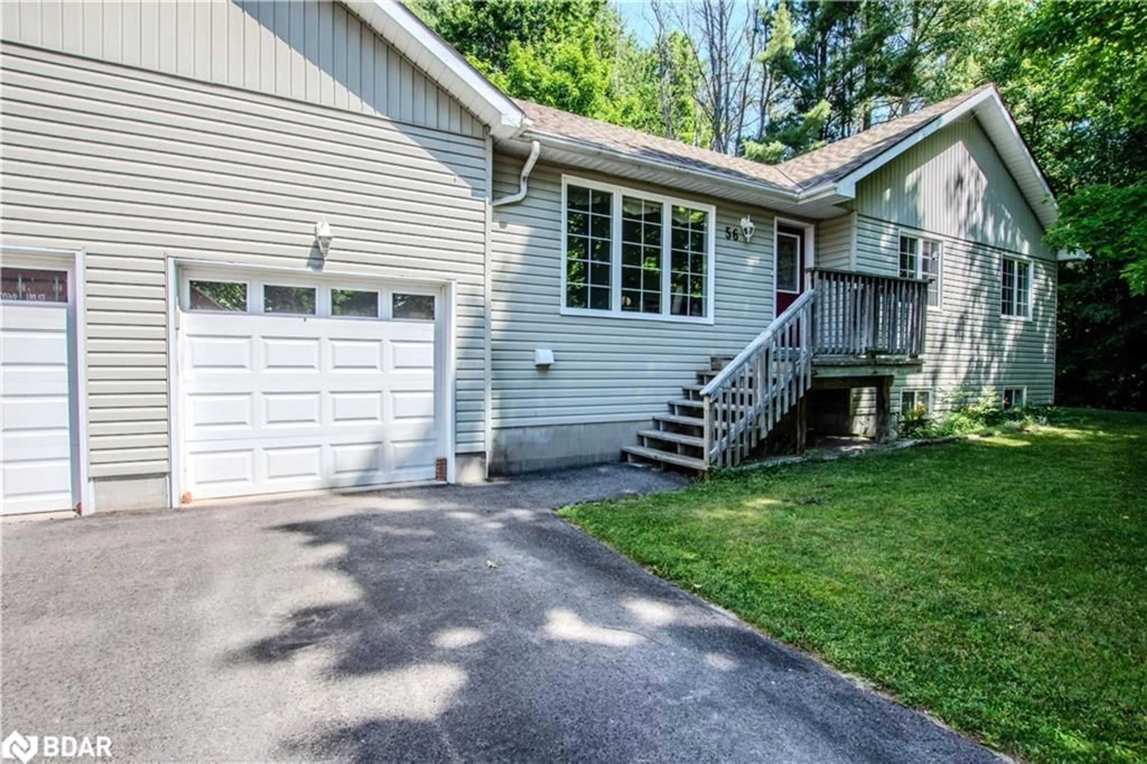 Home with vinyl exterior material, street for 56 Becketts Side Road Rd, Tay Twp Ontario L0K 2C0