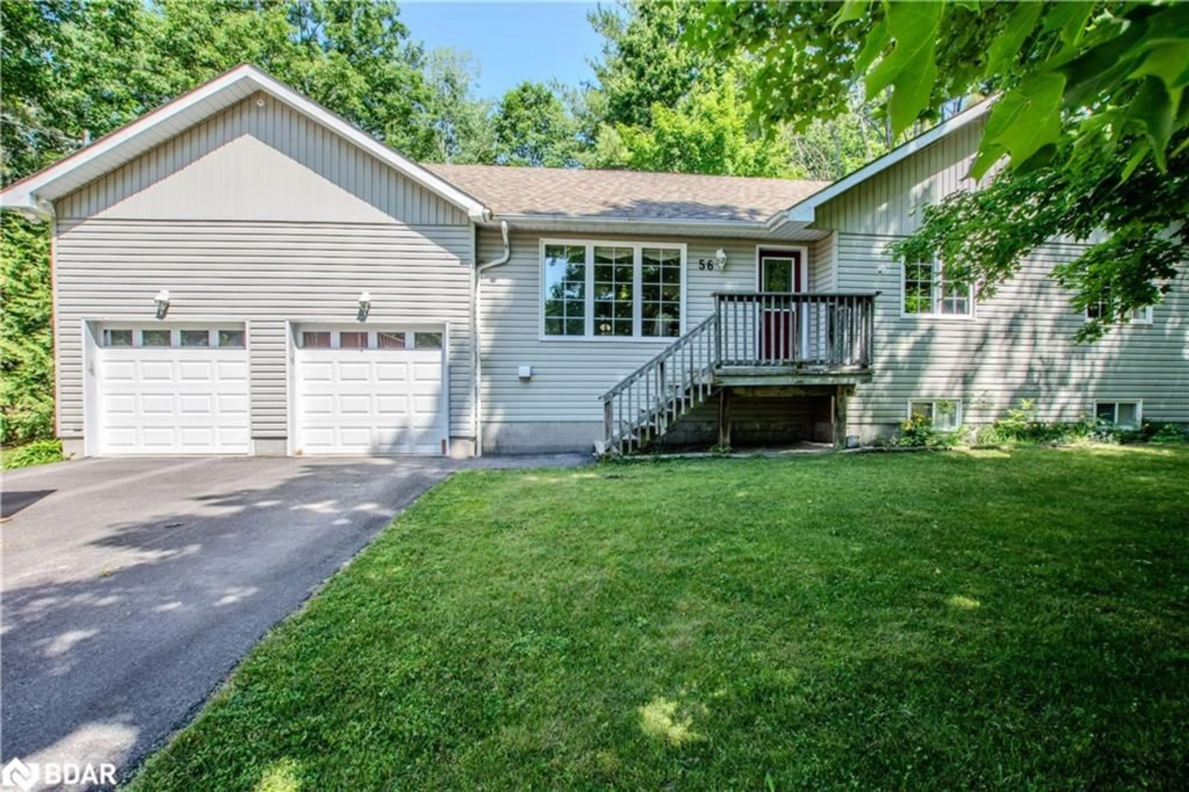 Home with vinyl exterior material, street for 56 Becketts Side Road Rd, Tay Twp Ontario L0K 2C0
