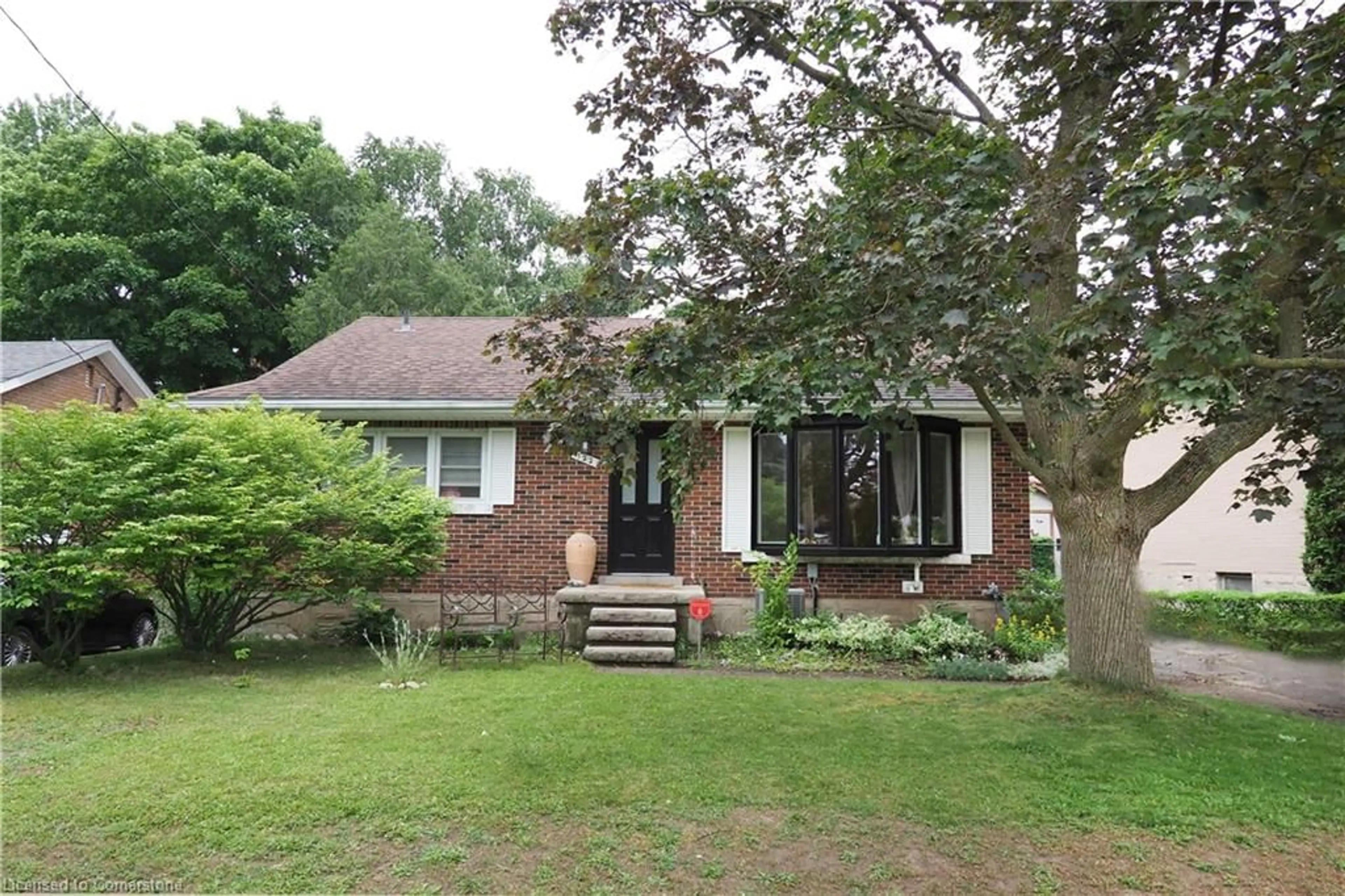Home with brick exterior material, street for 122 Boehmer St, Kitchener Ontario N2H 4N5