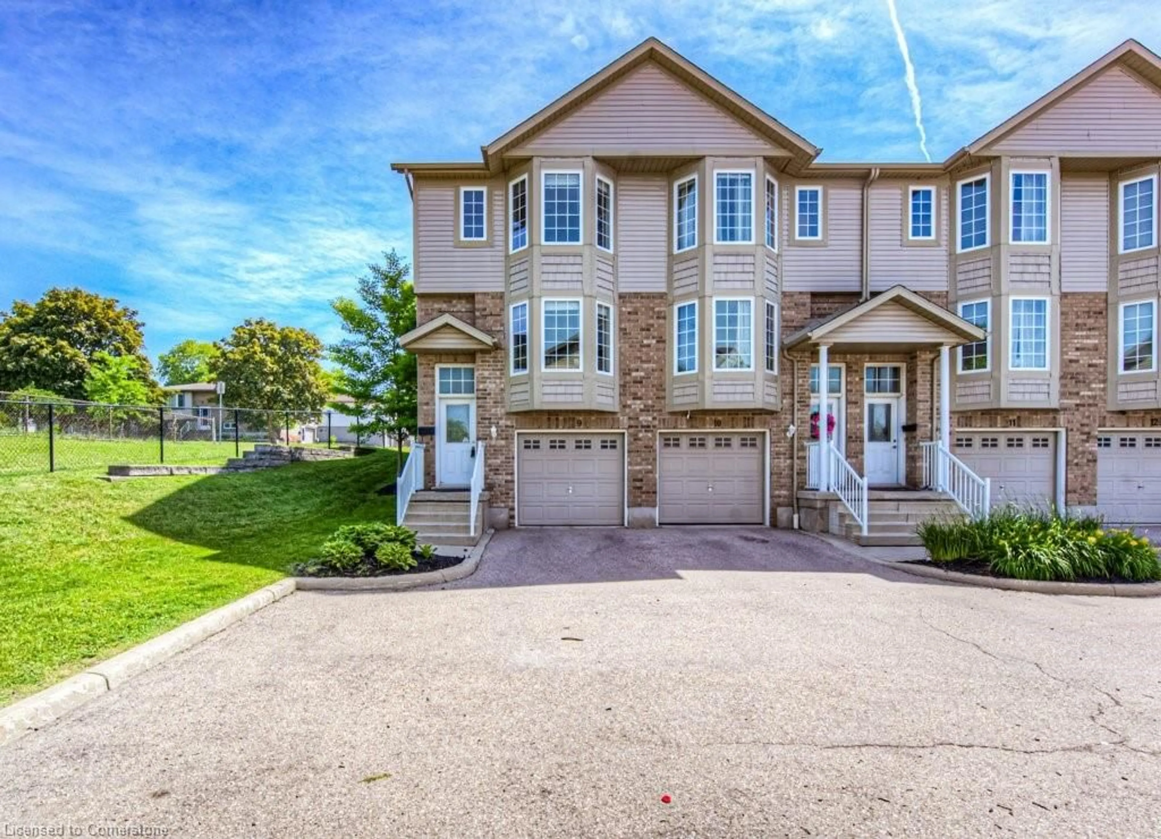 A pic from outside/outdoor area/front of a property/back of a property/a pic from drone, street for 975 Strasburg Rd #9, Kitchener Ontario N2E 0A8
