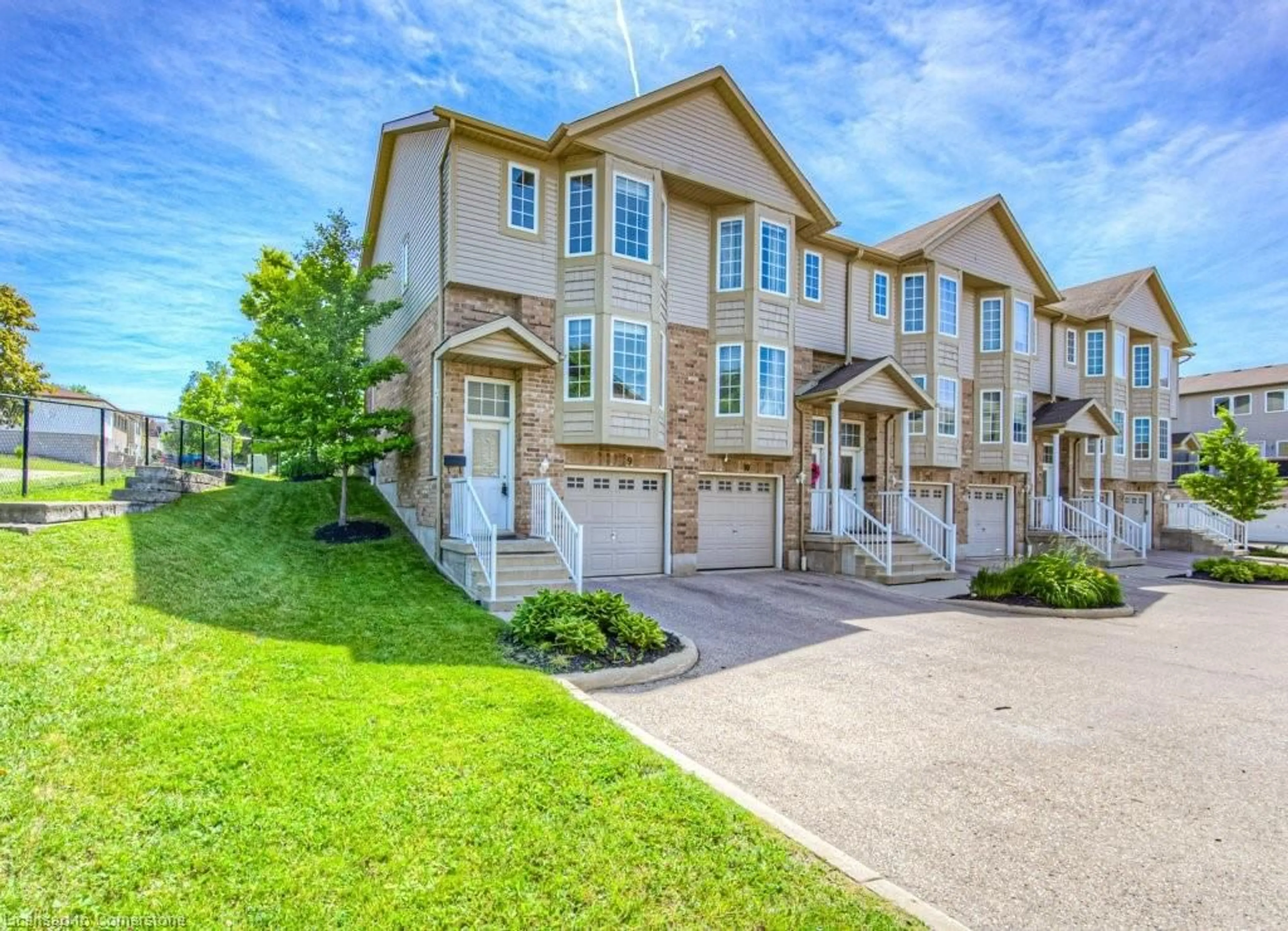 A pic from outside/outdoor area/front of a property/back of a property/a pic from drone, street for 975 Strasburg Rd #9, Kitchener Ontario N2E 0A8