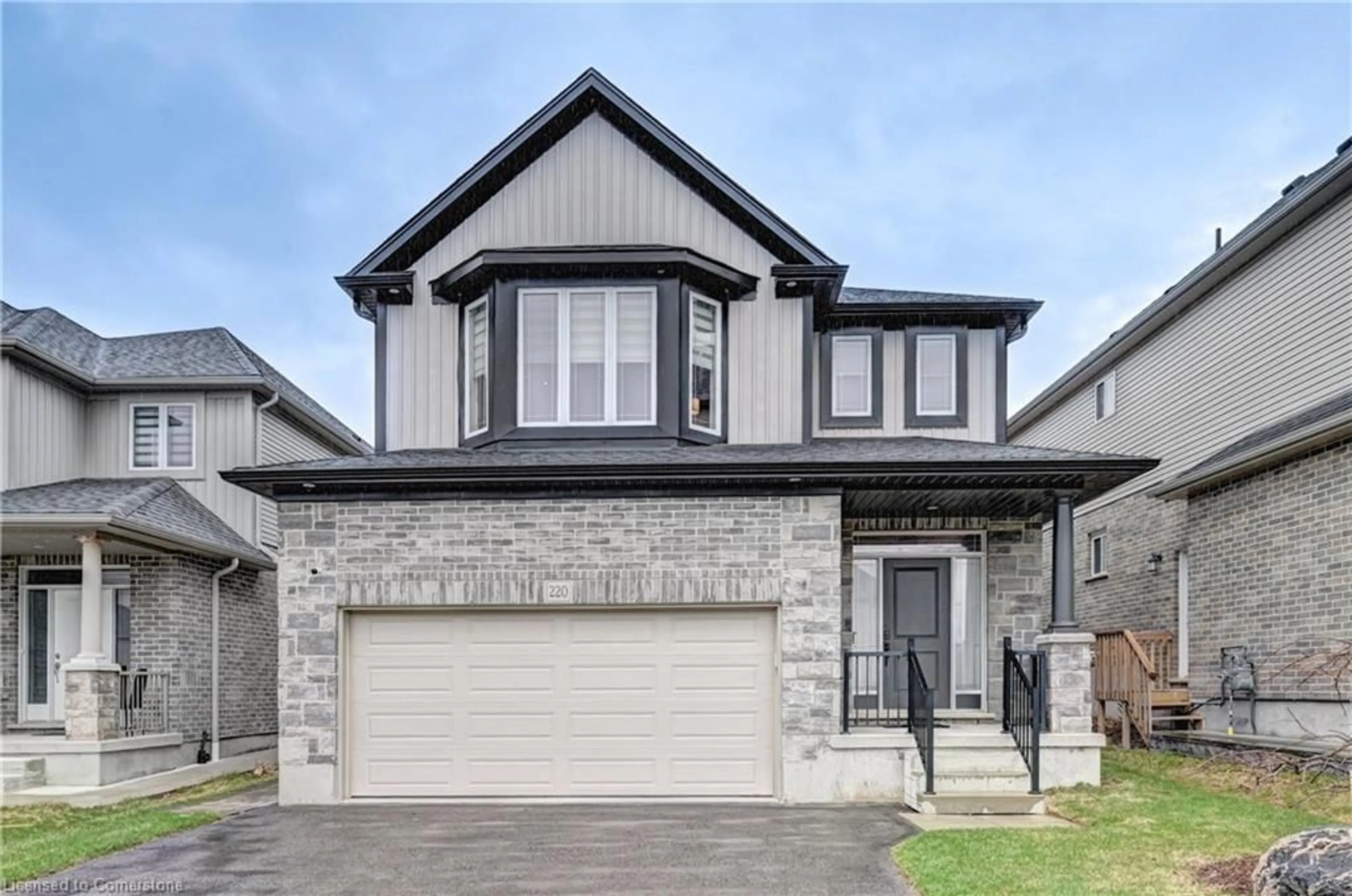Home with brick exterior material, street for 220 Ladyslipper Dr, Waterloo Ontario N2V 0E2