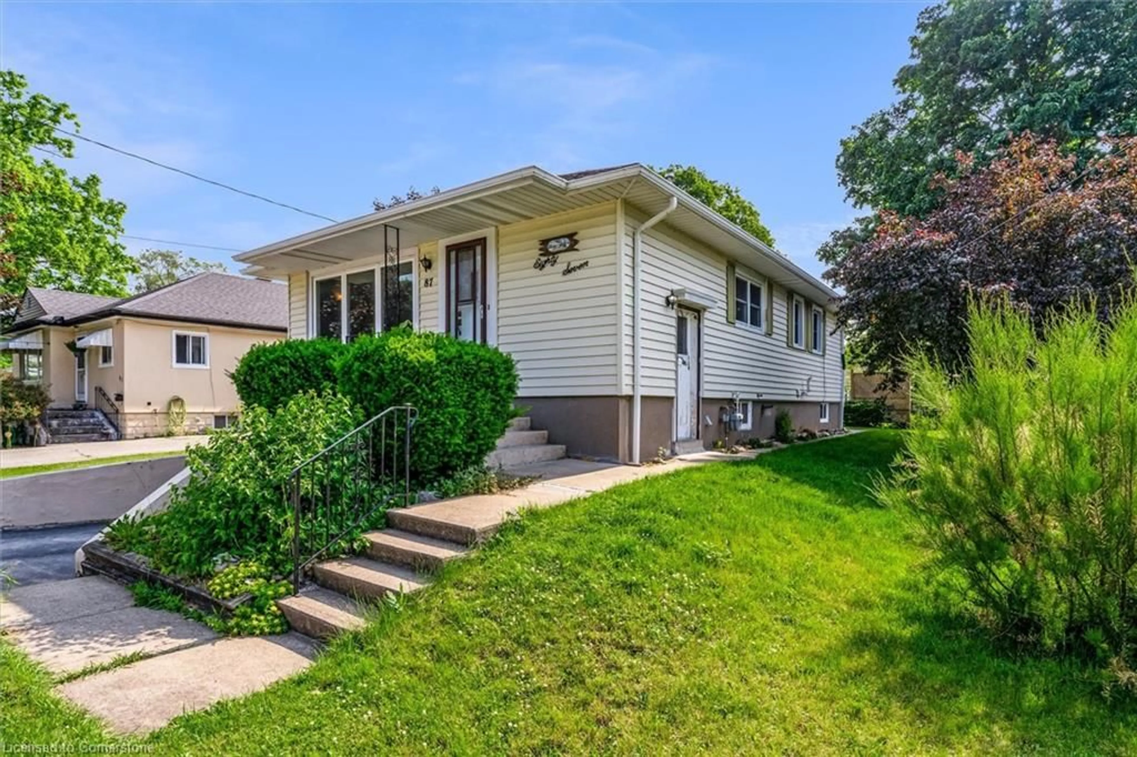 Home with vinyl exterior material, street for 87 Homewood Ave, Port Colborne Ontario L3K 5L7