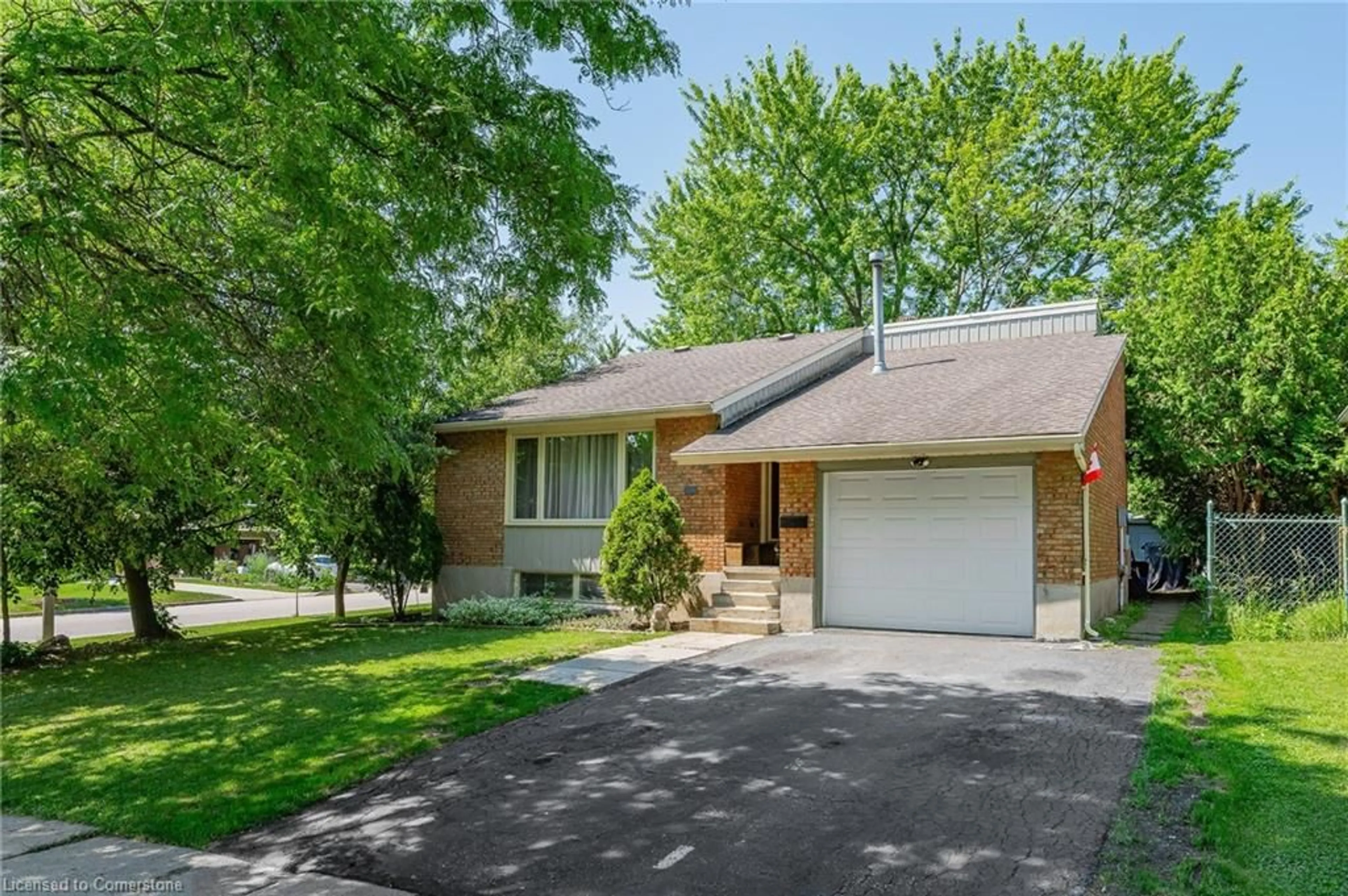 Home with brick exterior material, street for 31 Mulberry Lane, Waterloo Ontario N2L 5L4