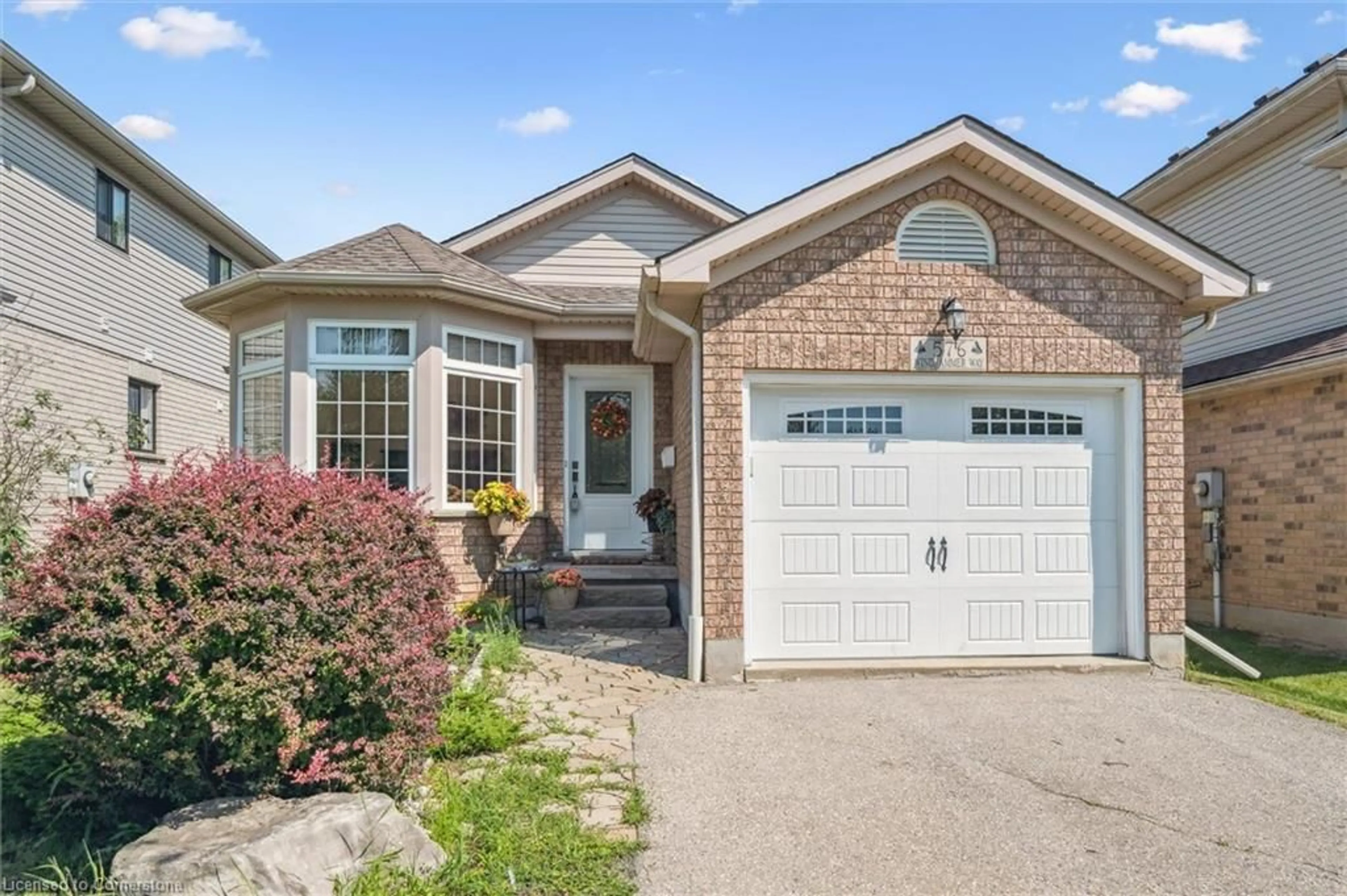 Home with brick exterior material, street for 576 Windjammer Way, Waterloo Ontario N2K 3Z5