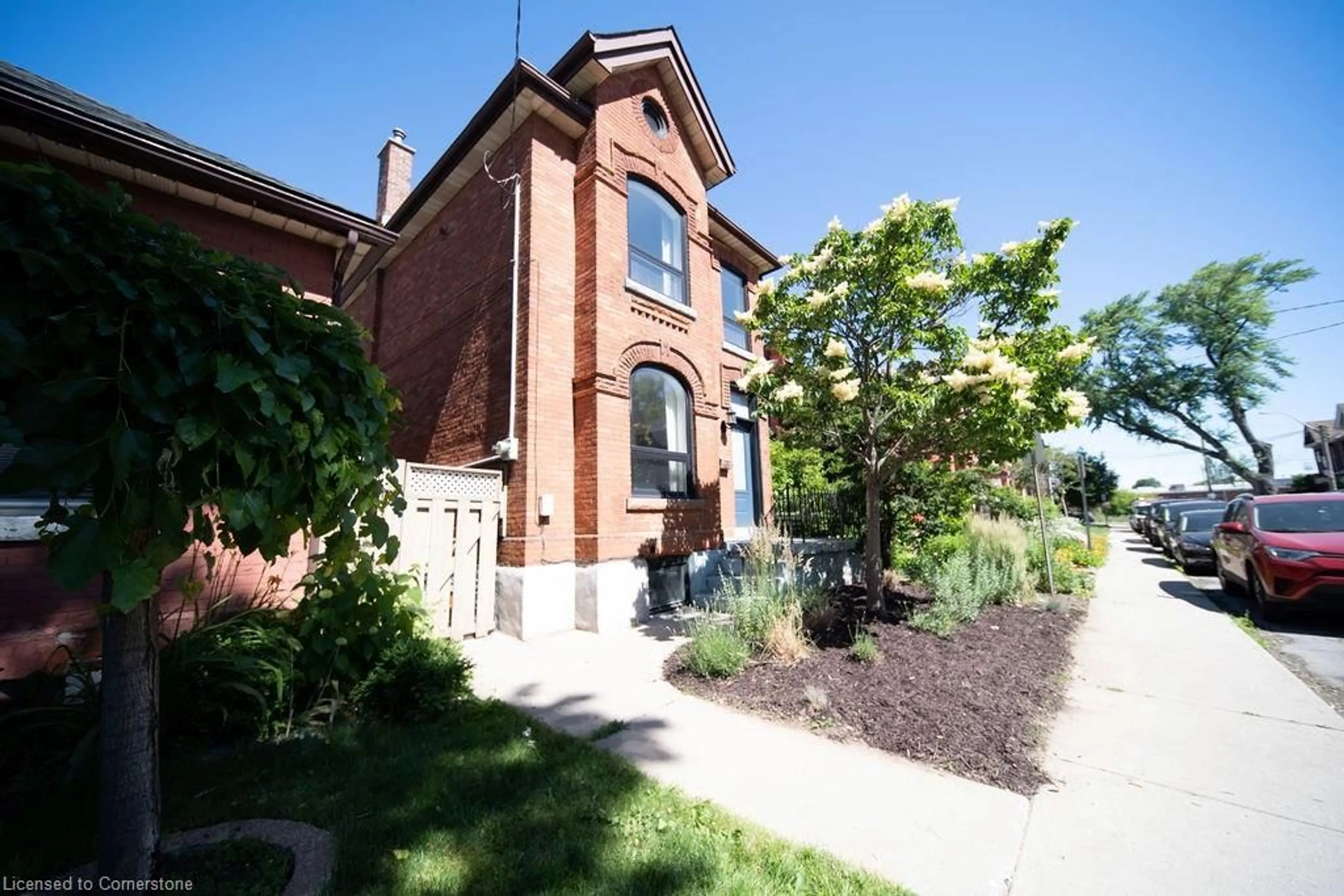 Home with brick exterior material, street for 61 William St, Hamilton Ontario L8L 5T6