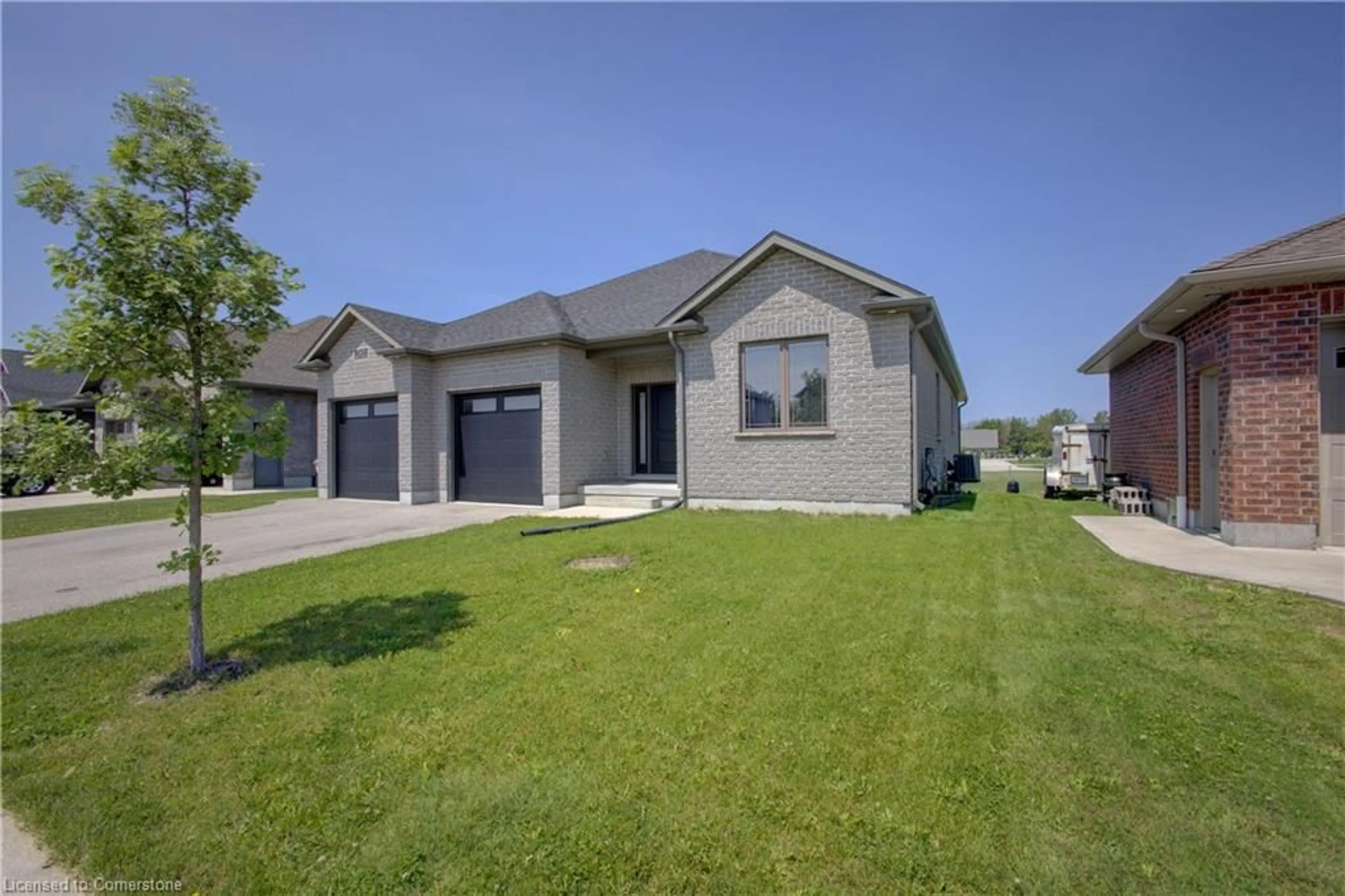 Home with brick exterior material, street for 745 Krotz St, Listowel Ontario N4W 0E4