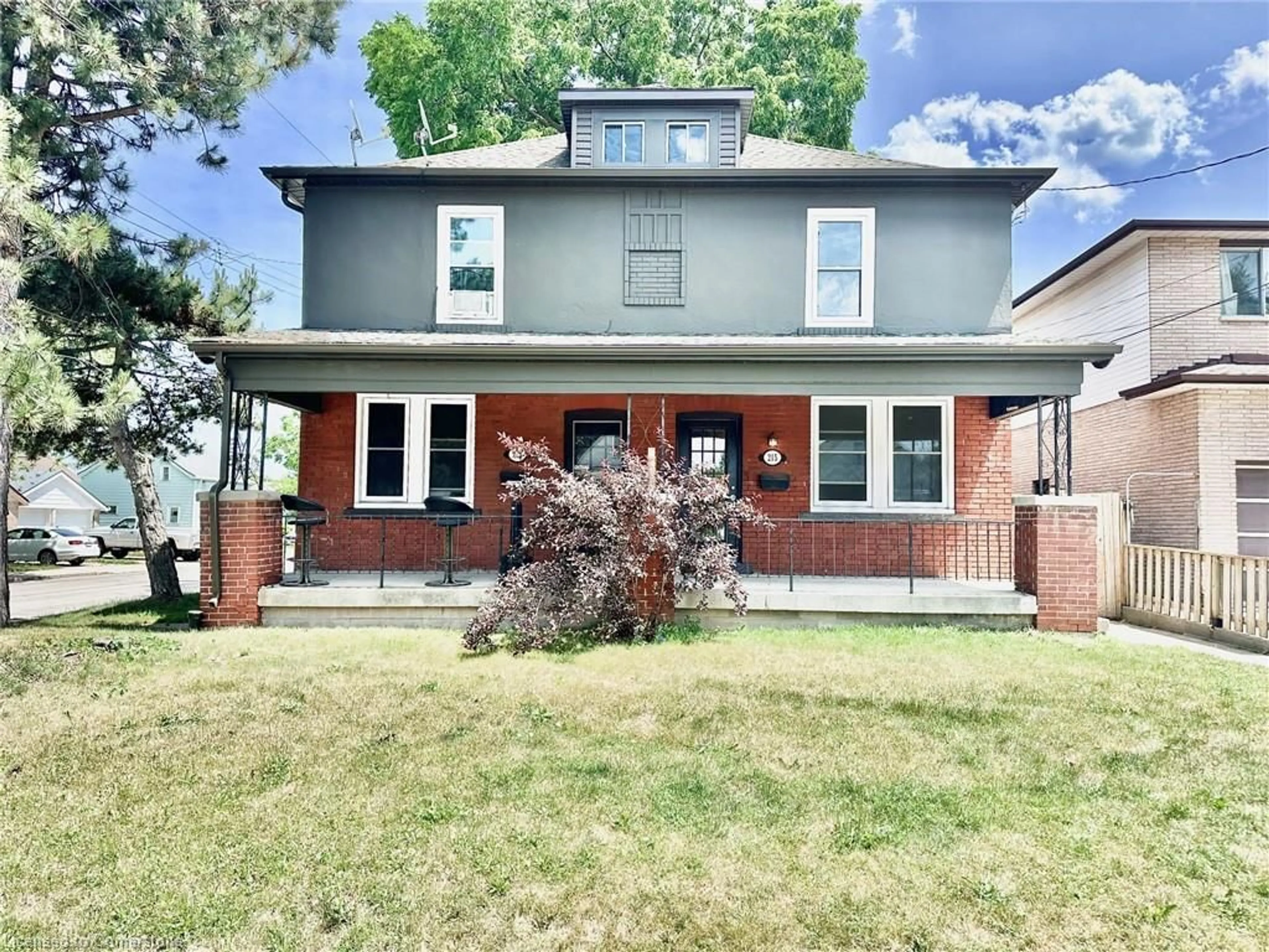 Home with brick exterior material, street for 215 Rosewood Rd, Hamilton Ontario L8K 3J5