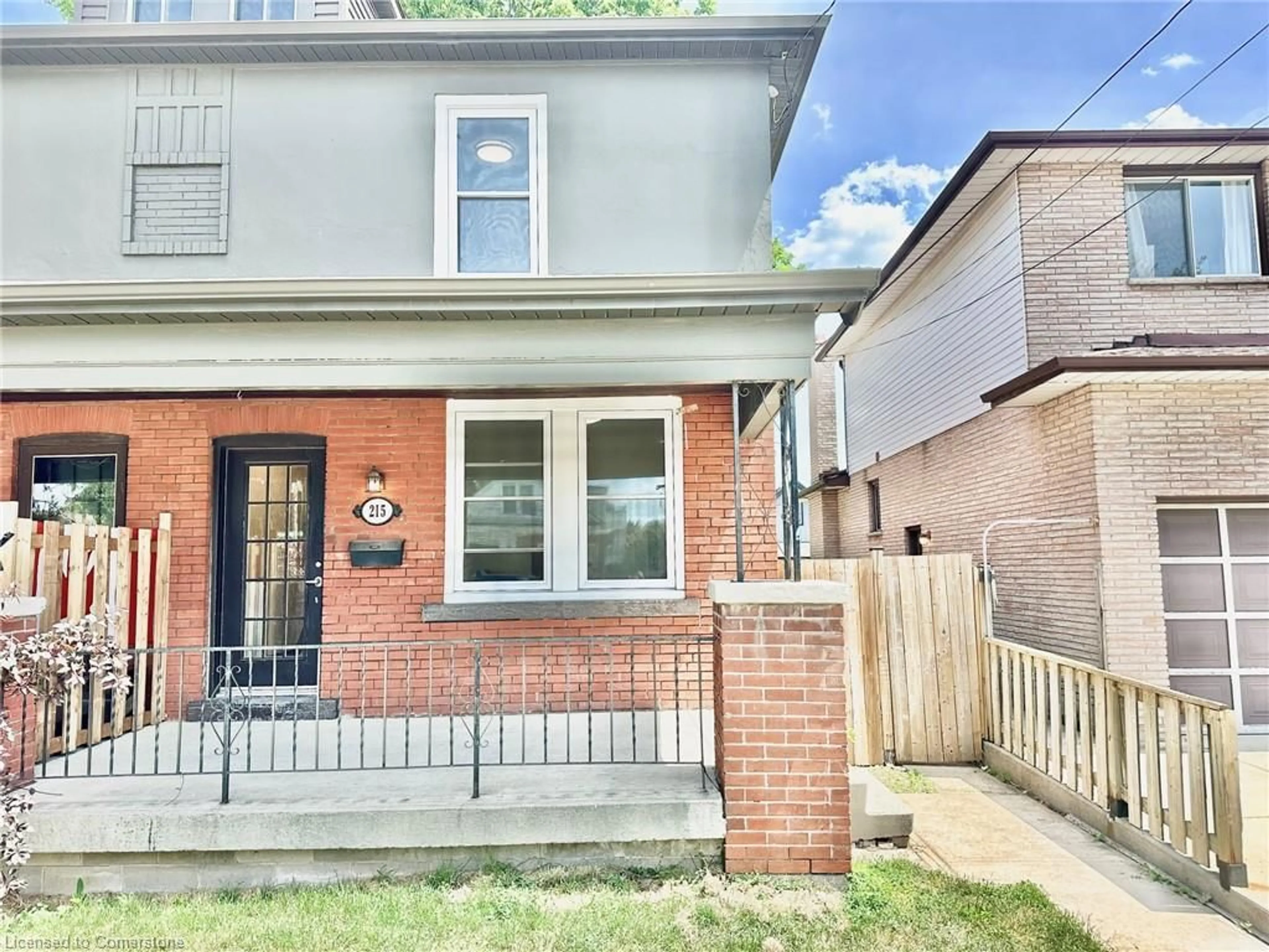 Home with brick exterior material, street for 215 Rosewood Rd, Hamilton Ontario L8K 3J5