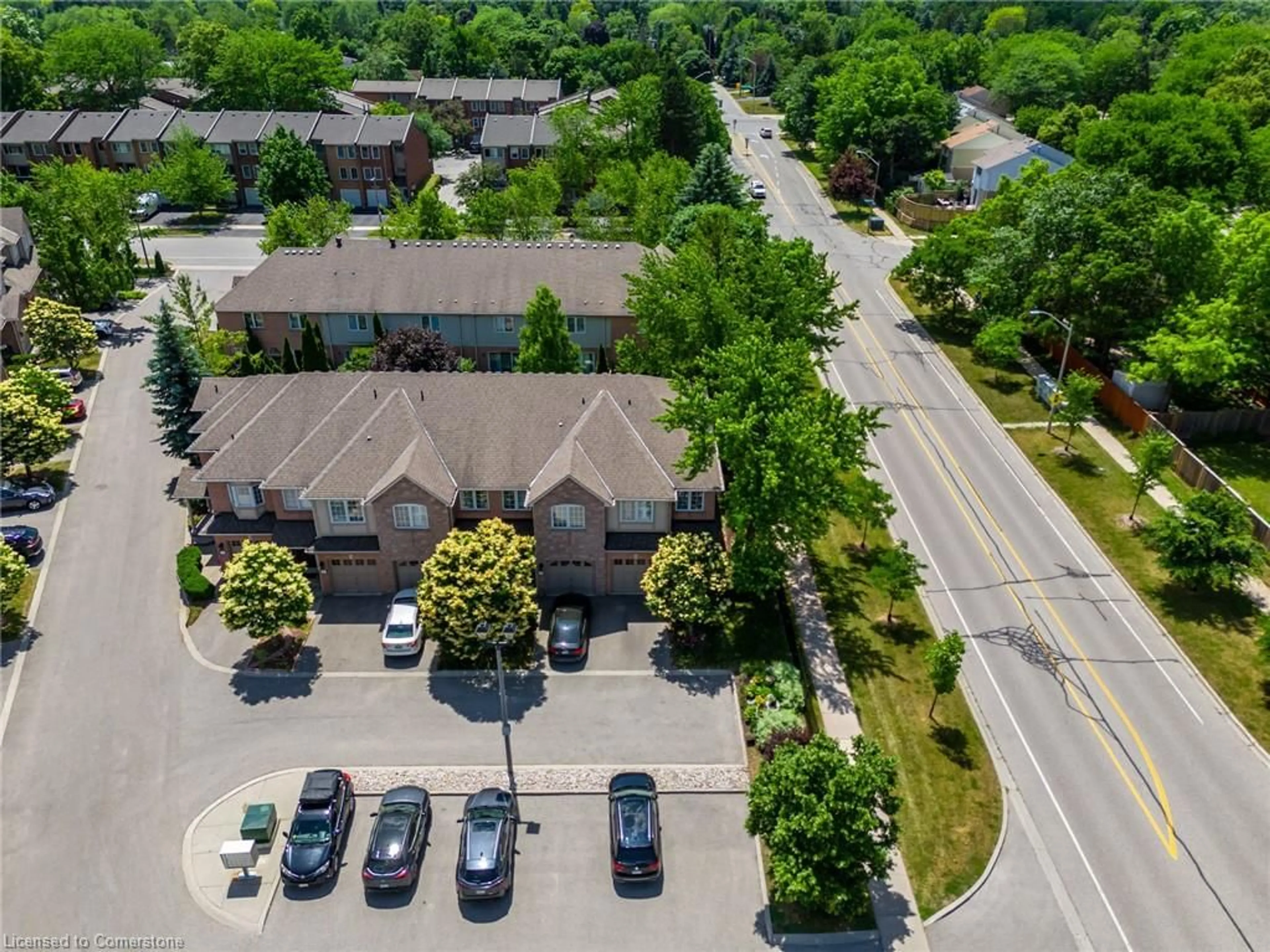 A pic from outside/outdoor area/front of a property/back of a property/a pic from drone, street for 1050 Grand Blvd #11, Oakville Ontario L6H 2S5