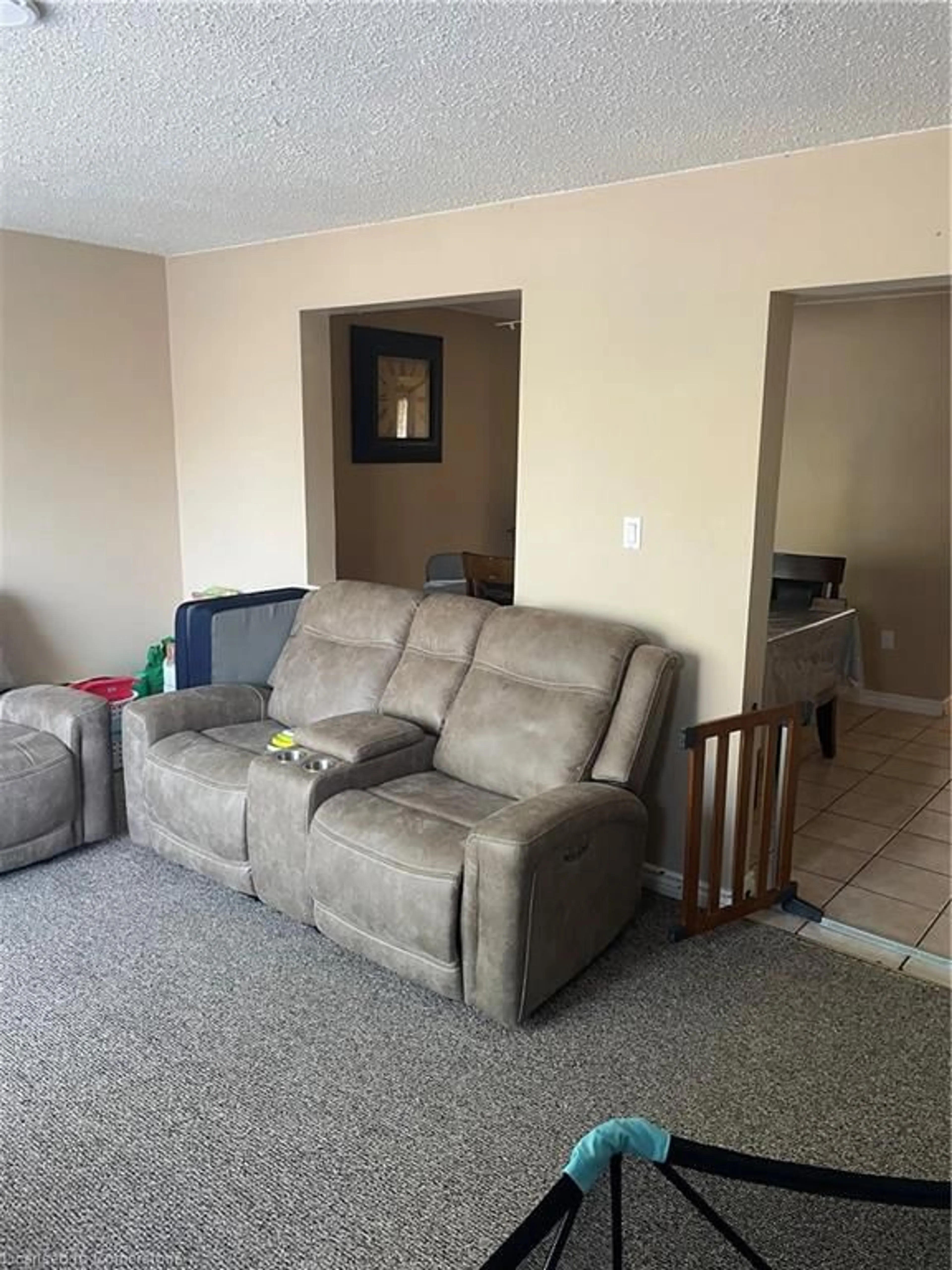 Living room with furniture, unknown for 10 Angus Rd #35, Hamilton Ontario L8K 6K3