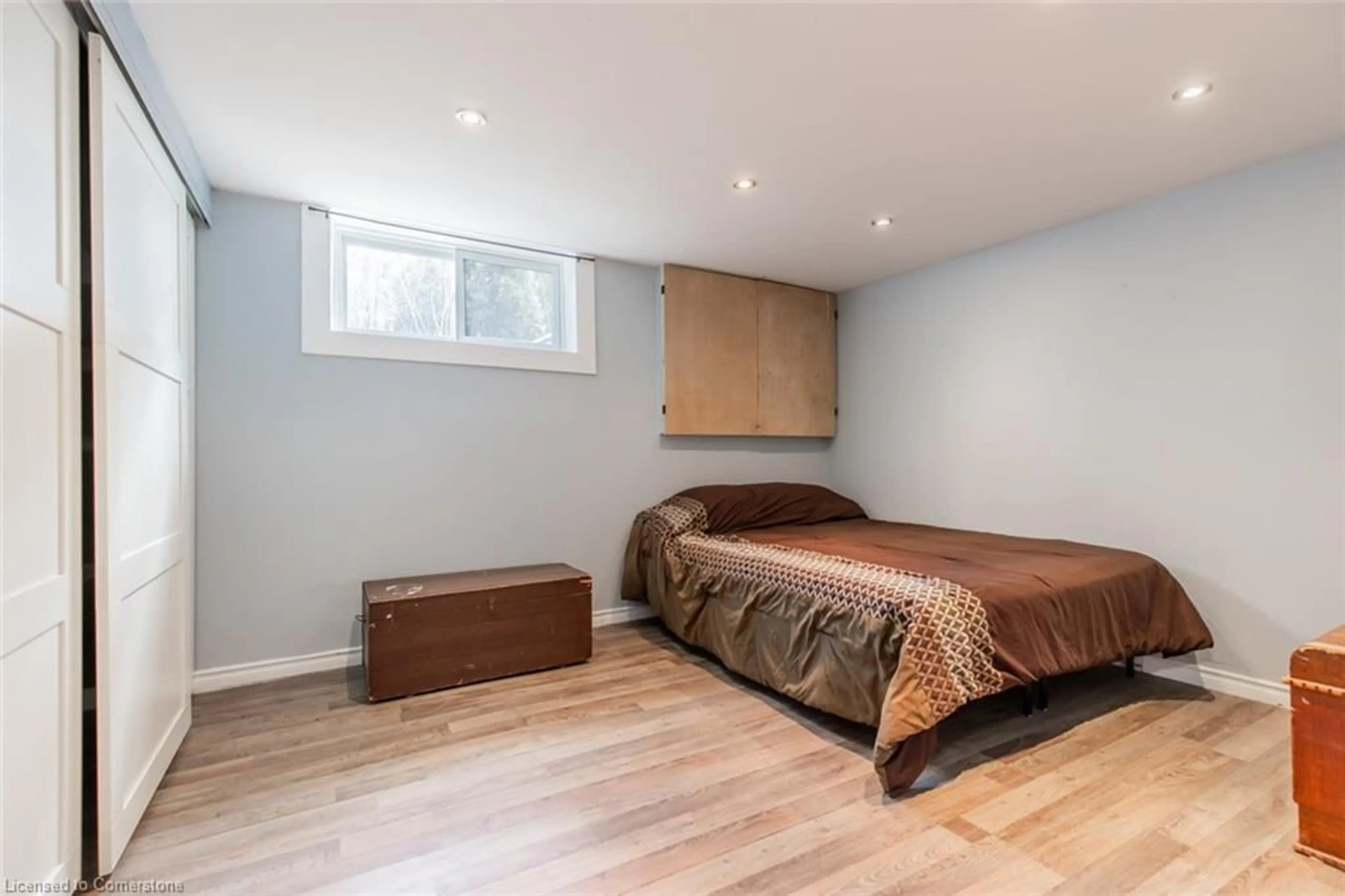 Bedroom with bed, wood/laminate floor for 1566 Caistorville Rd, Caistor Centre Ontario L0R 1E0