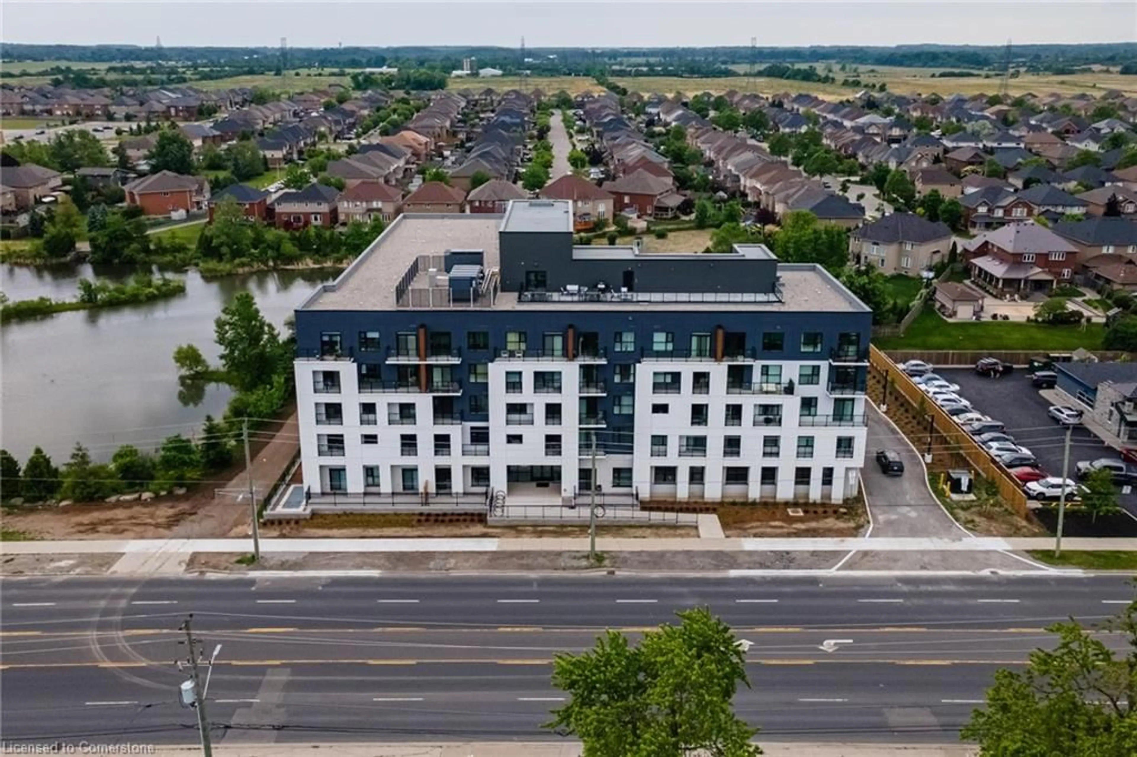 A pic from outside/outdoor area/front of a property/back of a property/a pic from drone, city buildings view from balcony for 1936 Rymal Rd #221, Hamilton Ontario L0R 1P0