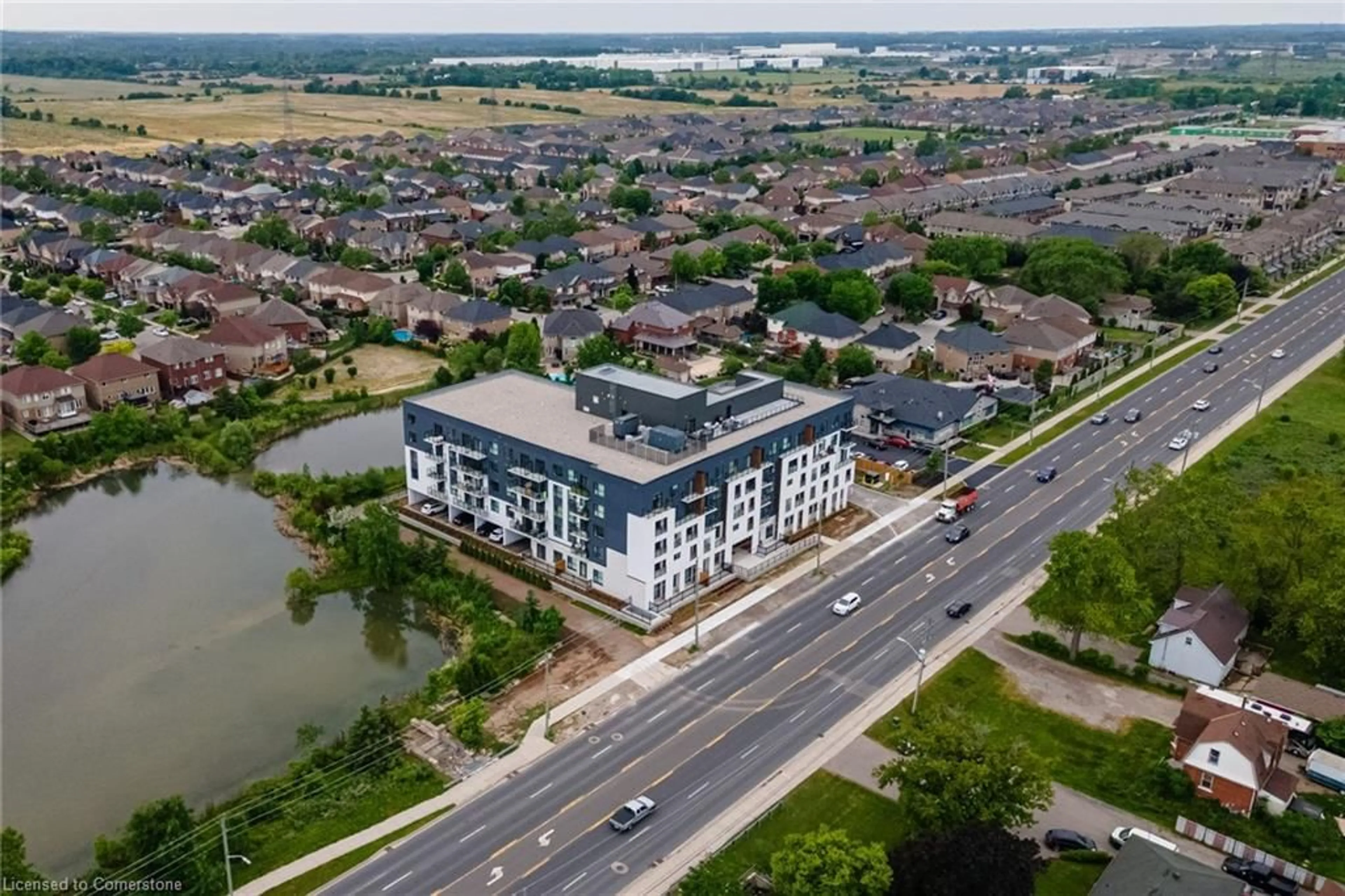 A pic from outside/outdoor area/front of a property/back of a property/a pic from drone, water/lake/river/ocean view for 1936 Rymal Rd #221, Hamilton Ontario L0R 1P0
