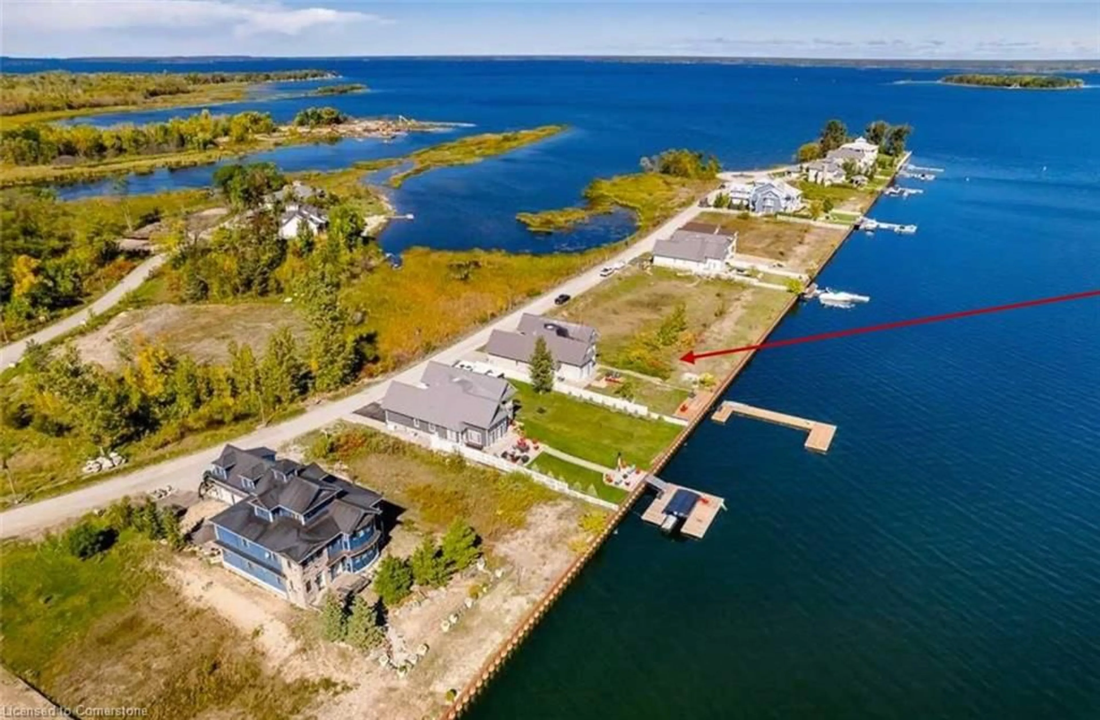 A pic from outside/outdoor area/front of a property/back of a property/a pic from drone, water/lake/river/ocean view for 47 Dock Lane, Simcoe Ontario L0K 1R0