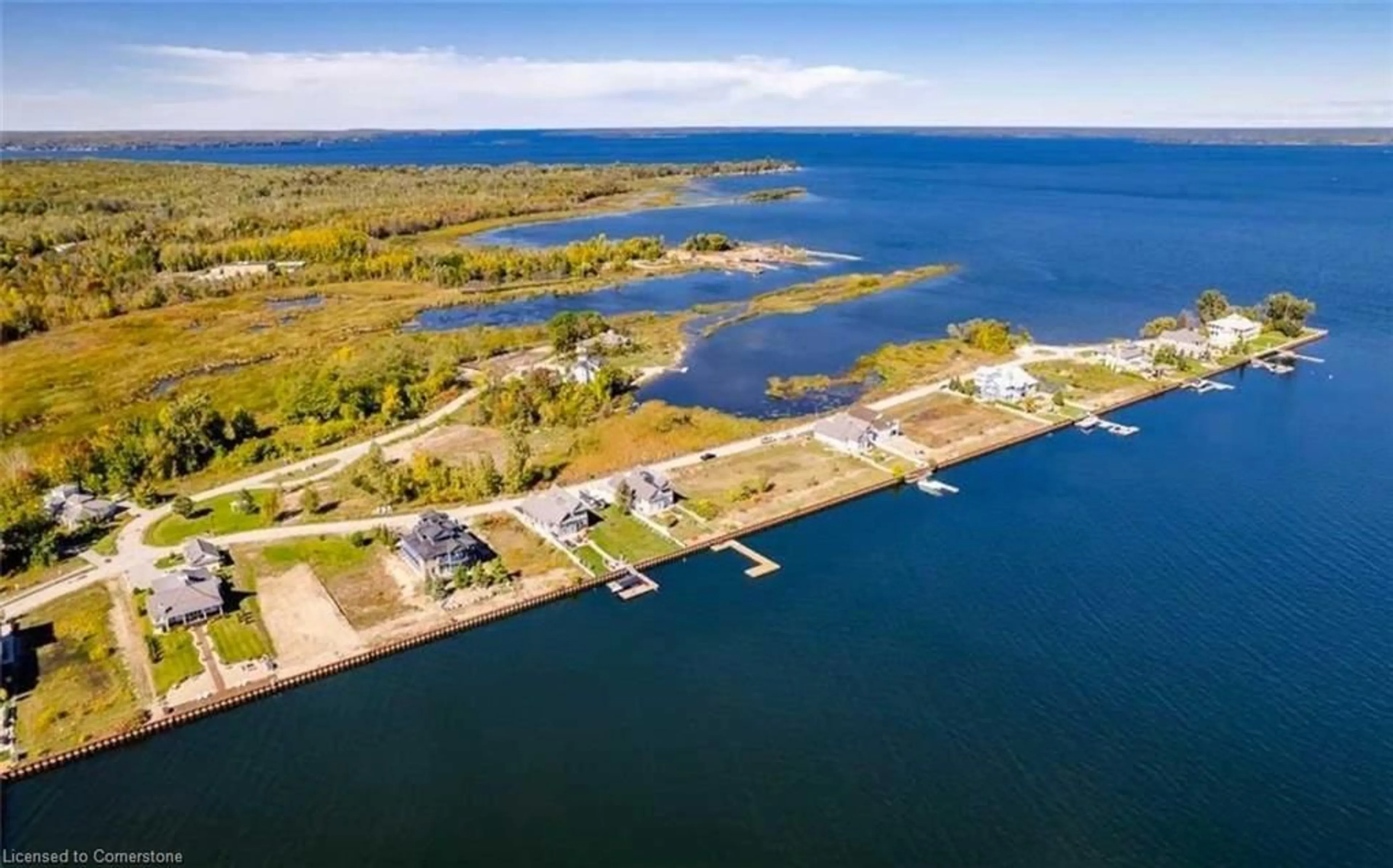 A pic from outside/outdoor area/front of a property/back of a property/a pic from drone, water/lake/river/ocean view for 47 Dock Lane, Simcoe Ontario L0K 1R0