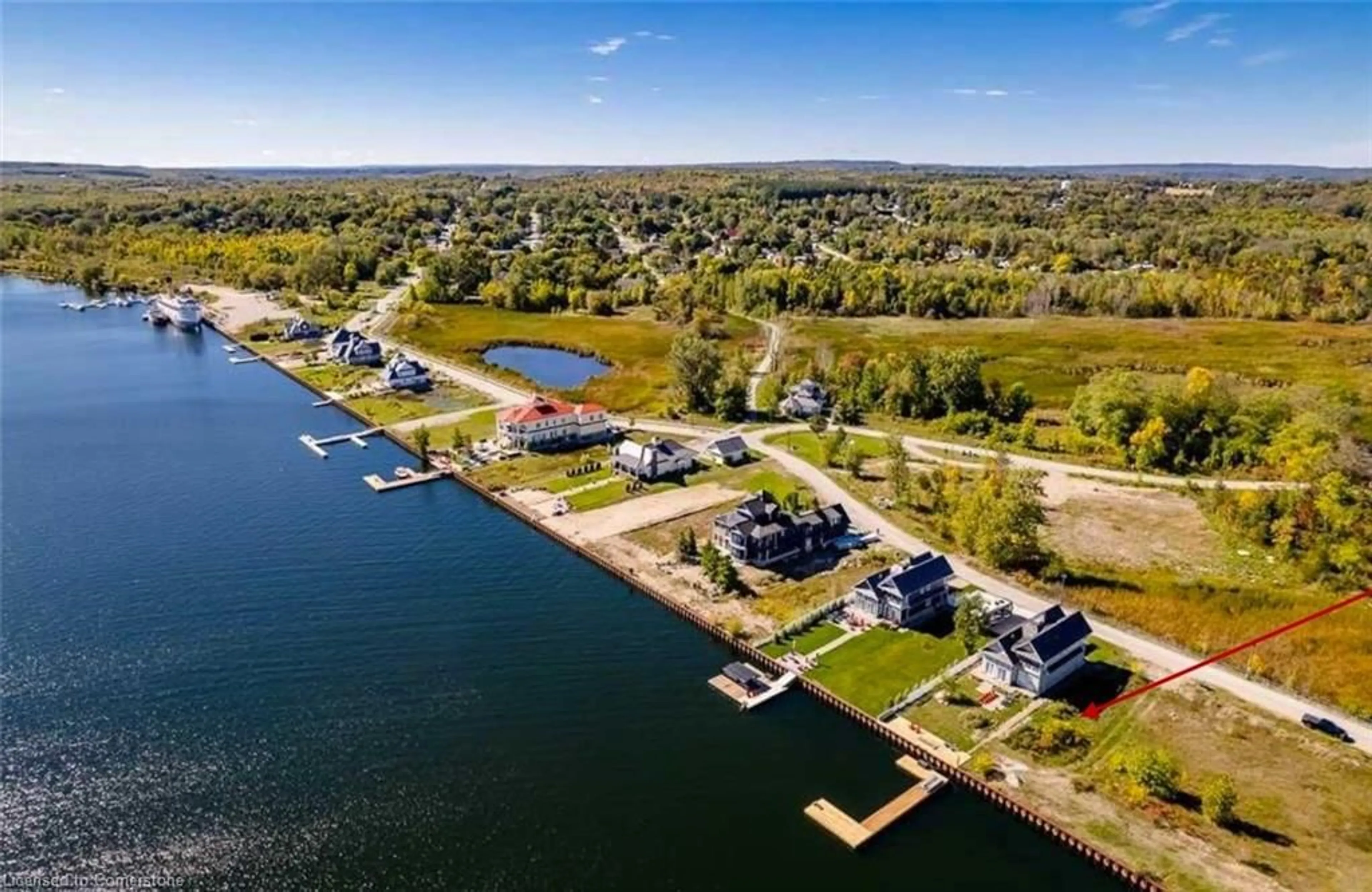 A pic from outside/outdoor area/front of a property/back of a property/a pic from drone, water/lake/river/ocean view for 47 Dock Lane, Simcoe Ontario L0K 1R0