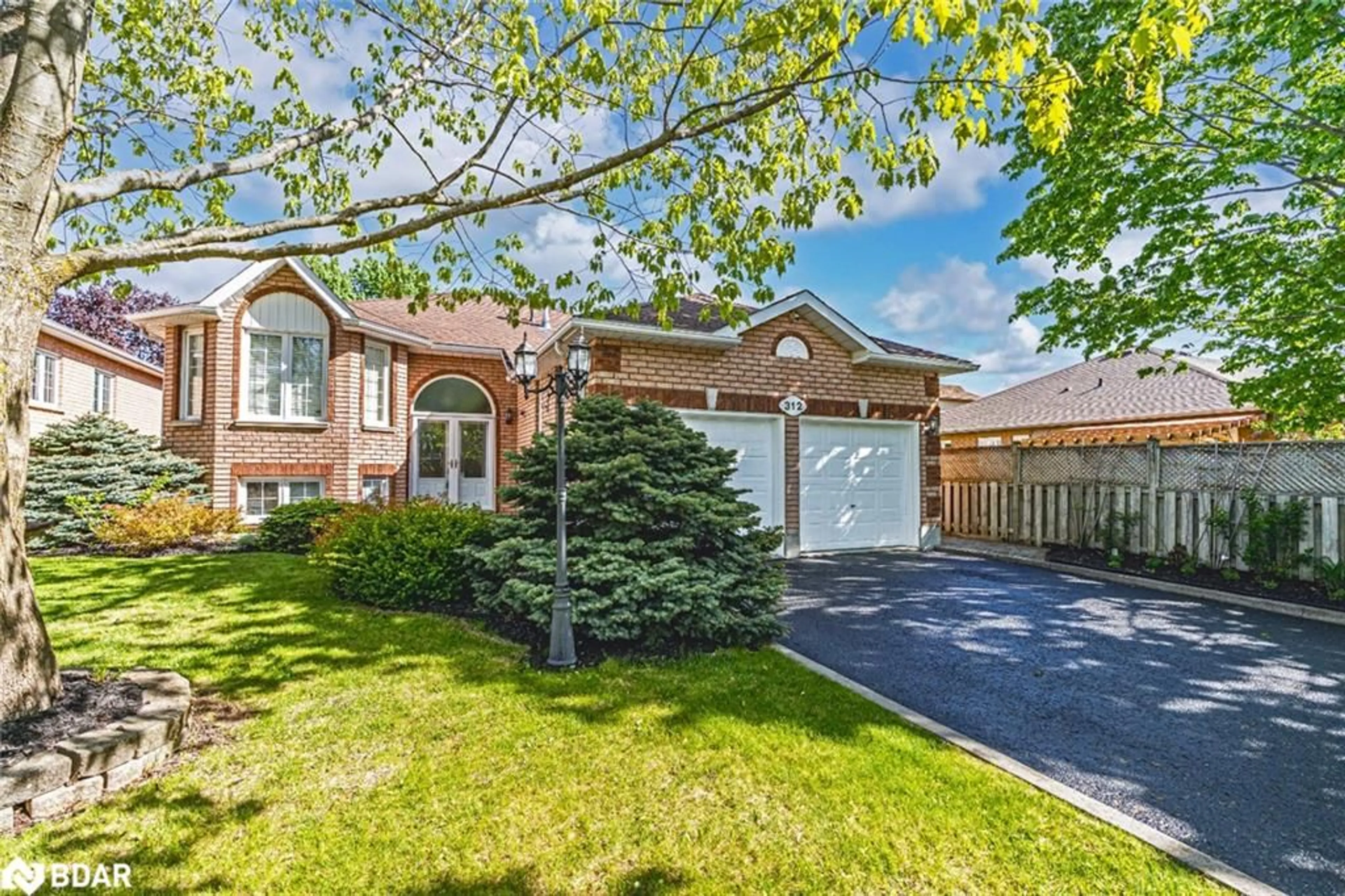 Home with brick exterior material, street for 312 Harvie Rd, Barrie Ontario L4N 8H1
