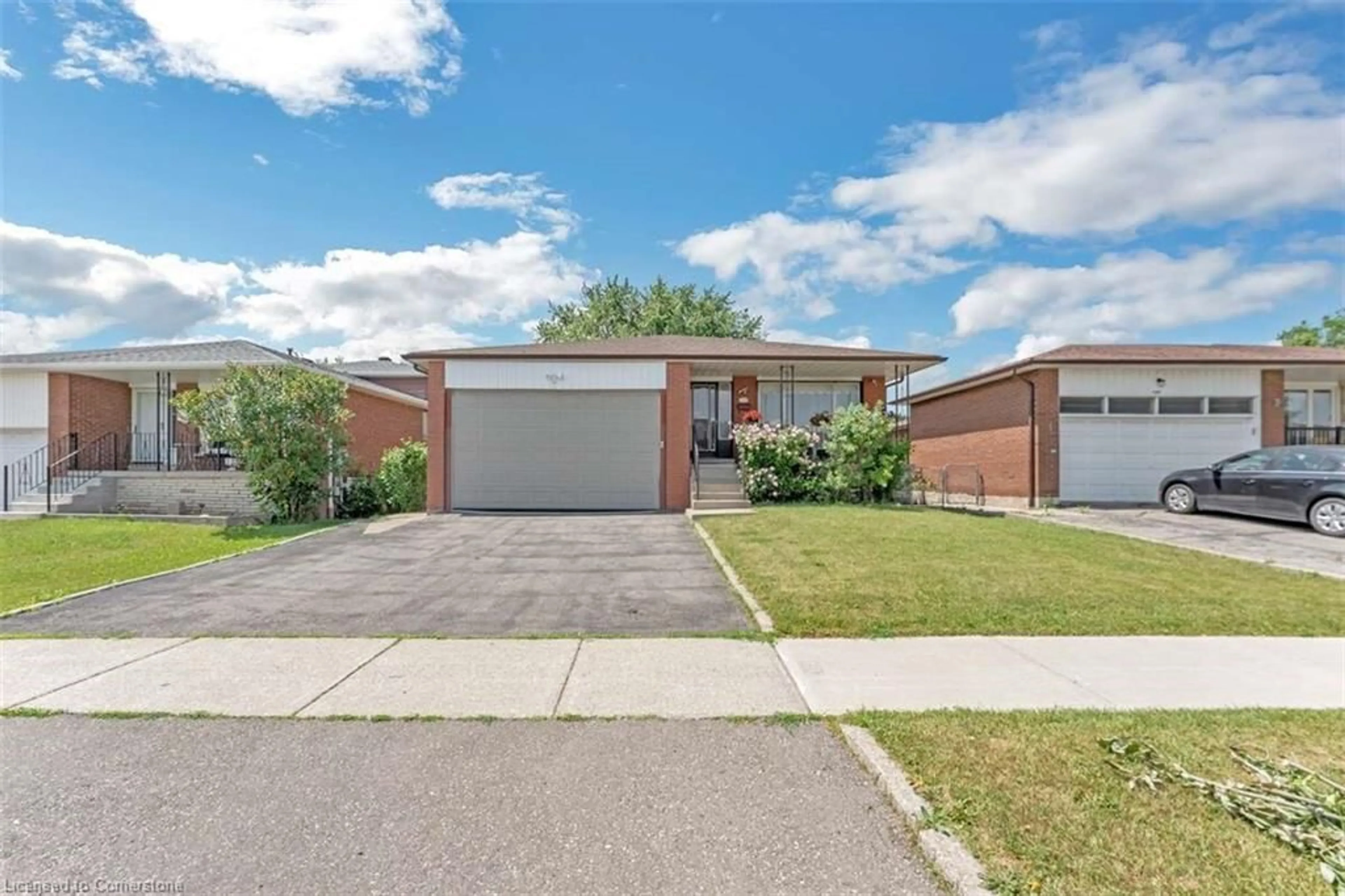 Home with brick exterior material, street for 3383 Brandon Gate Dr, Mississauga Ontario L4T 3J7