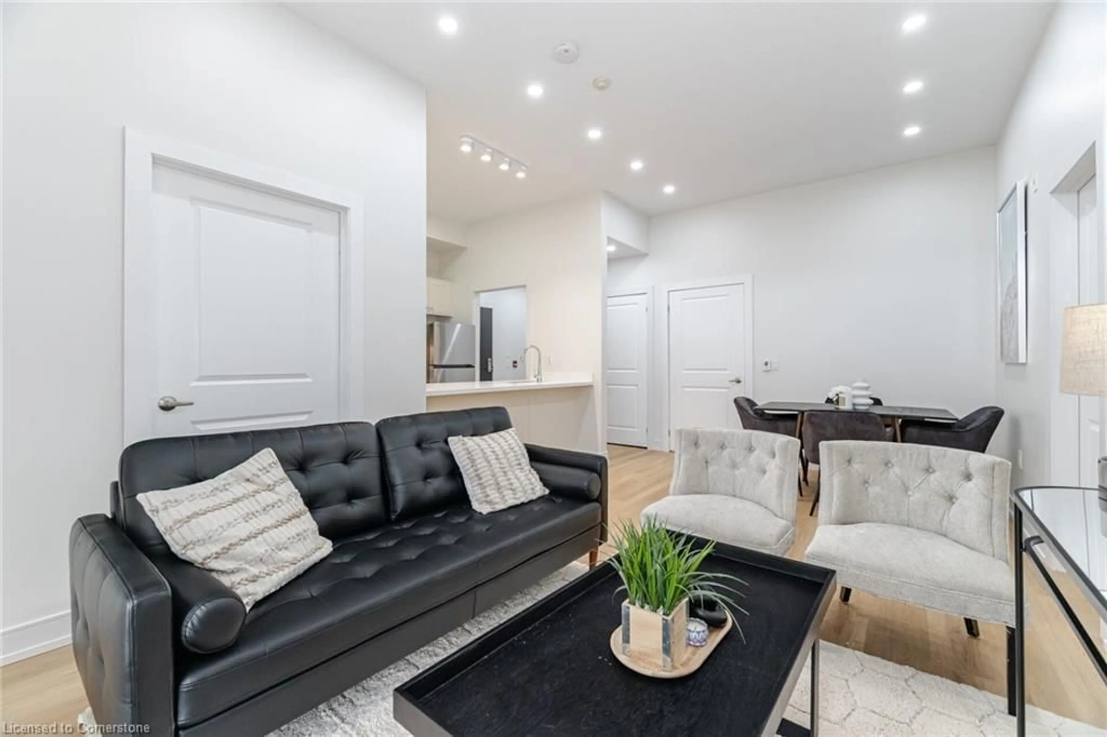 Living room with furniture, unknown for 2326 Taunton Road #103, Oakville Ontario L6H 0L3
