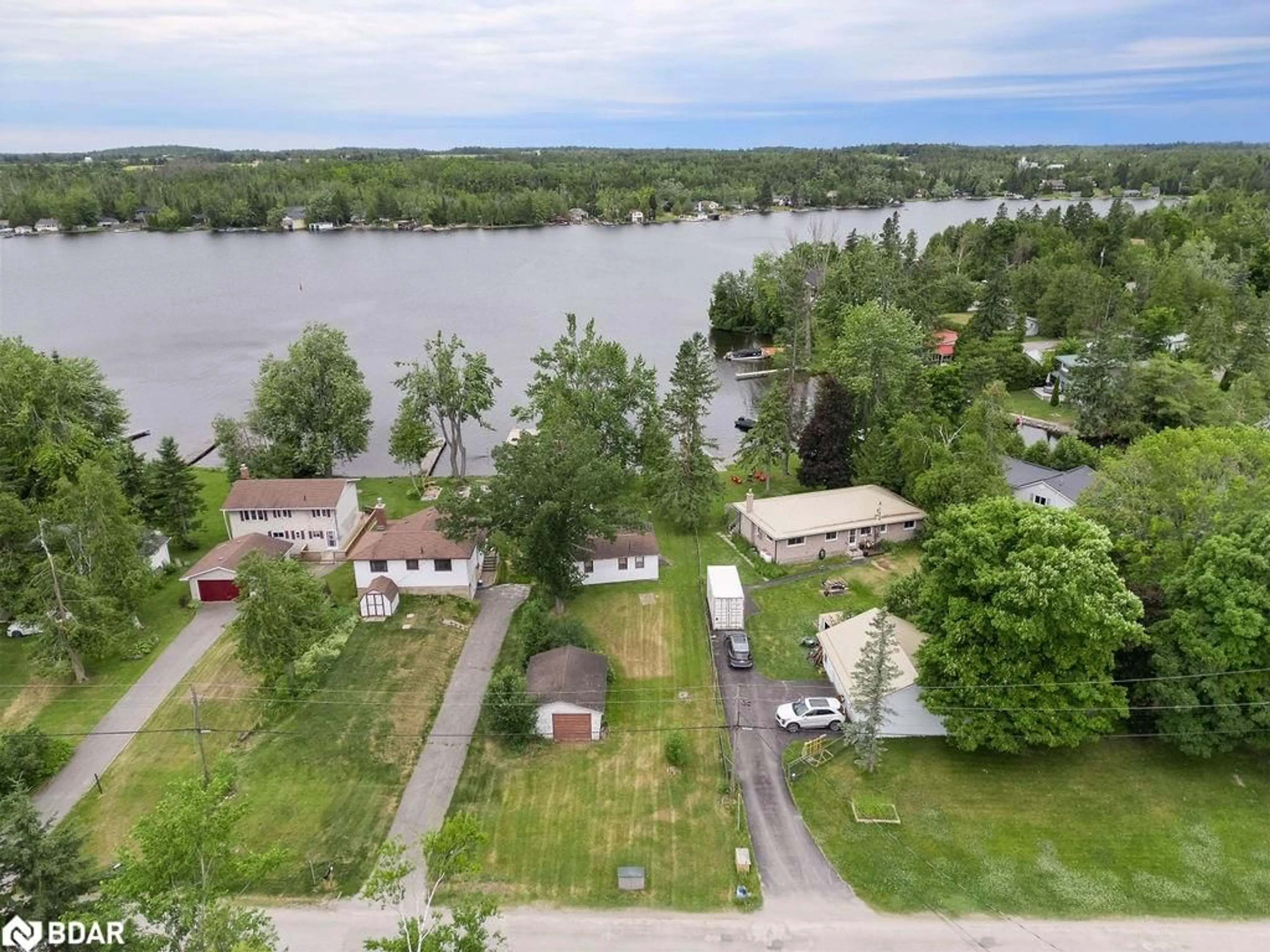 A pic from outside/outdoor area/front of a property/back of a property/a pic from drone, water/lake/river/ocean view for 58 Sturgeon Glen Rd, Fenelon Falls Ontario K0M 1N0