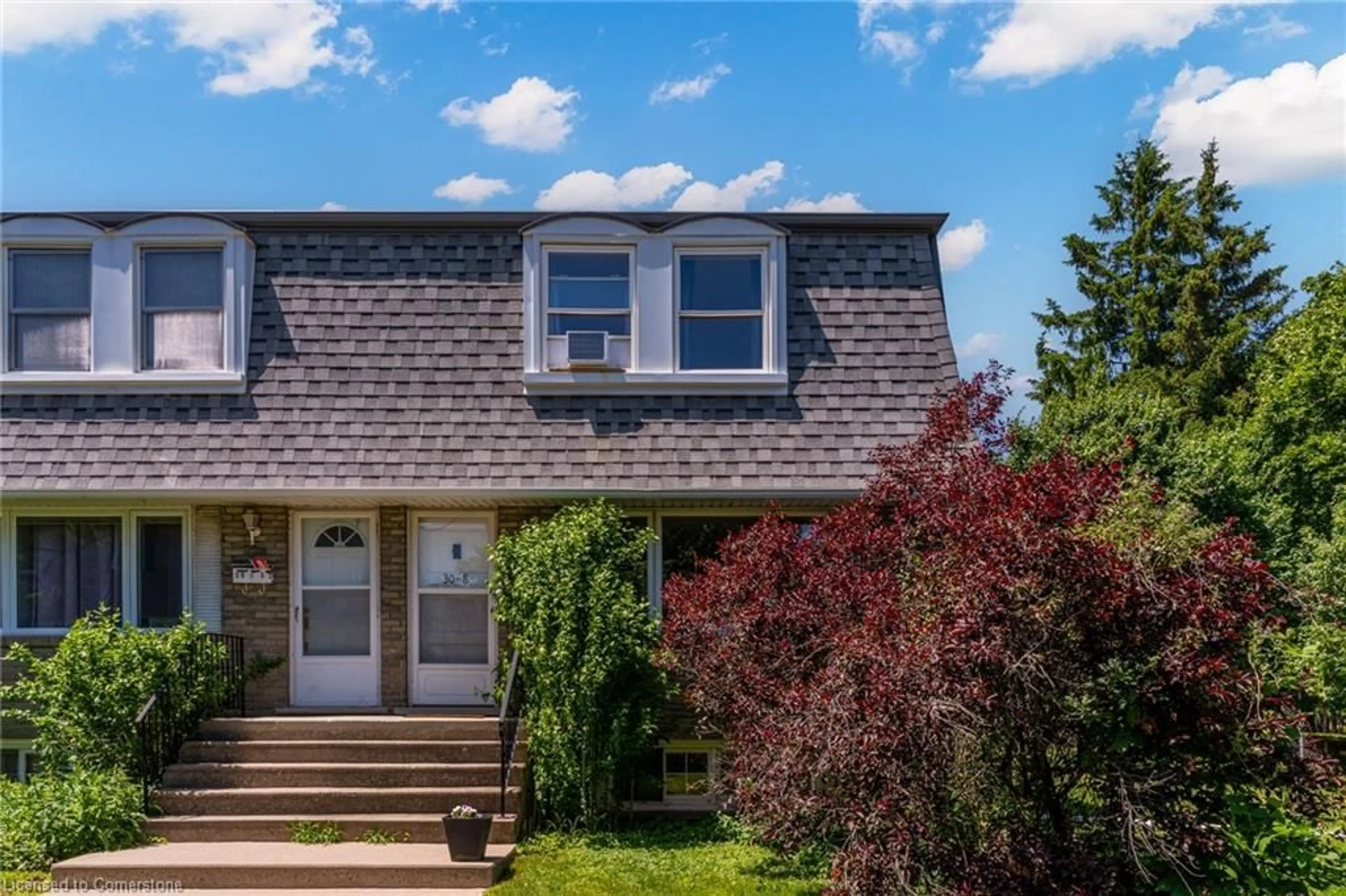 Home with vinyl exterior material, street for 30 Coachwood Rd #8, Brantford Ontario N3R 3R4