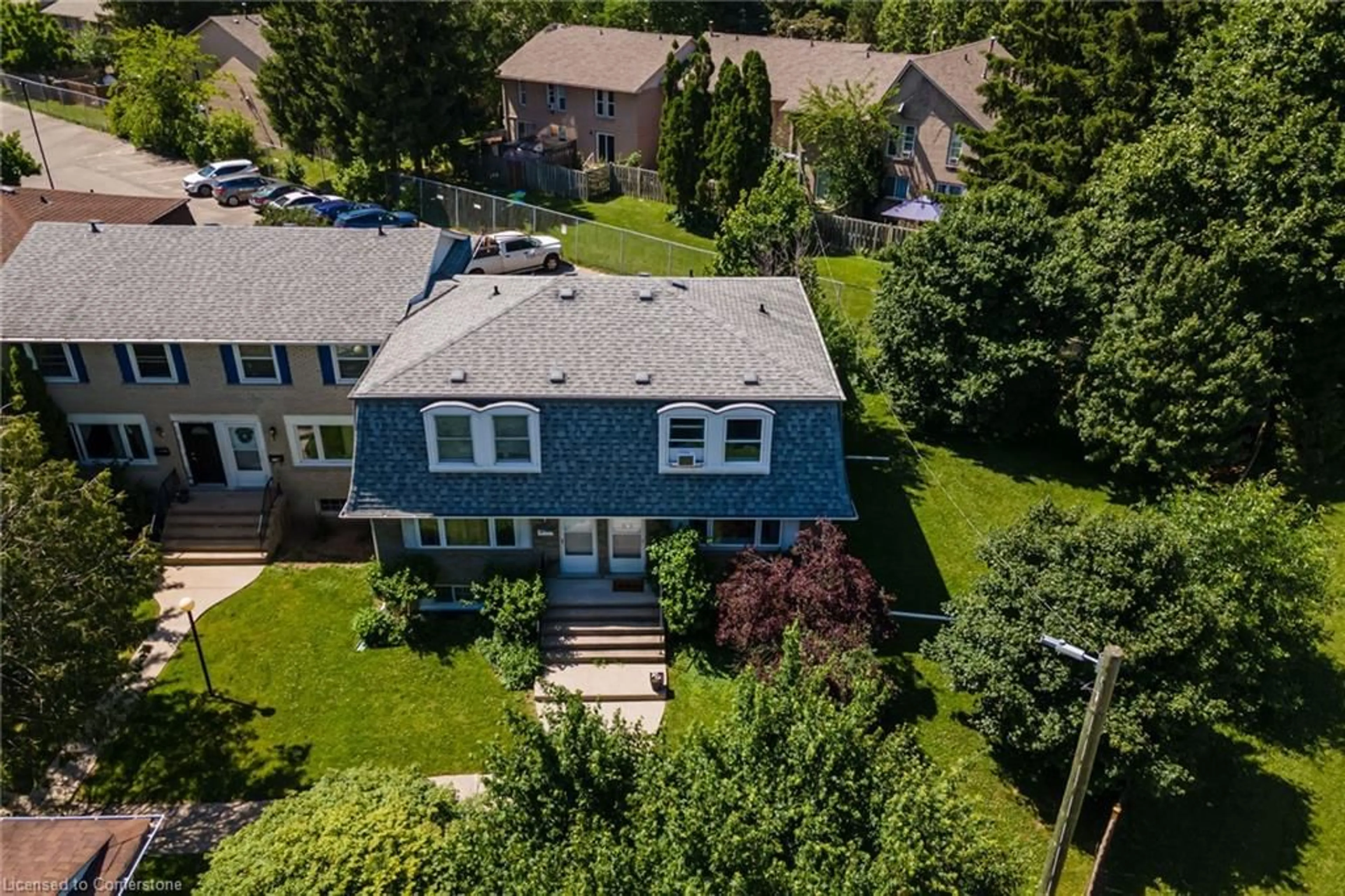 A pic from outside/outdoor area/front of a property/back of a property/a pic from drone, street for 30 Coachwood Rd #8, Brantford Ontario N3R 3R4