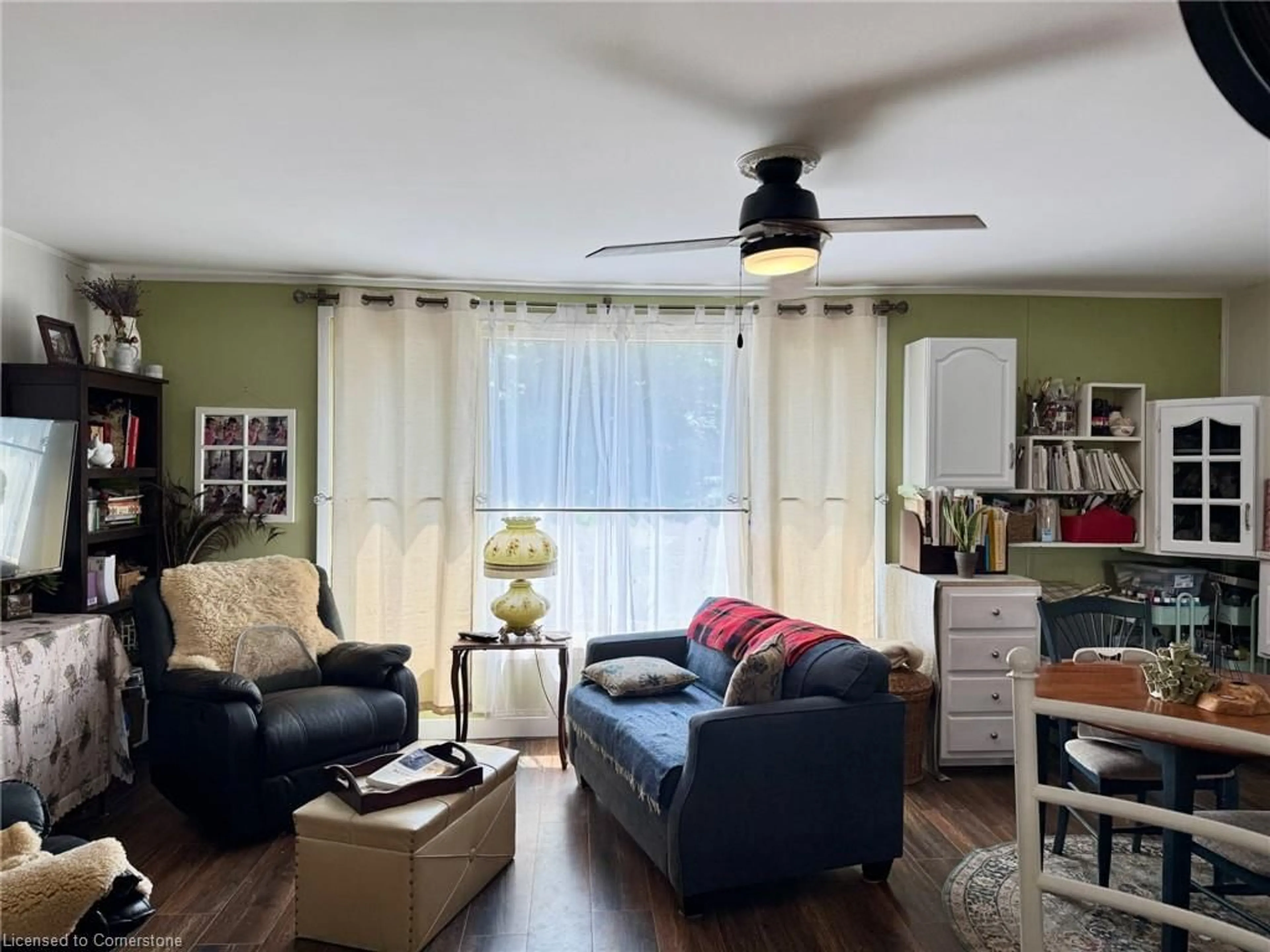 Living room with furniture, wood/laminate floor for 30 Bee St, Booth's Harbour Ontario N0E 1P0