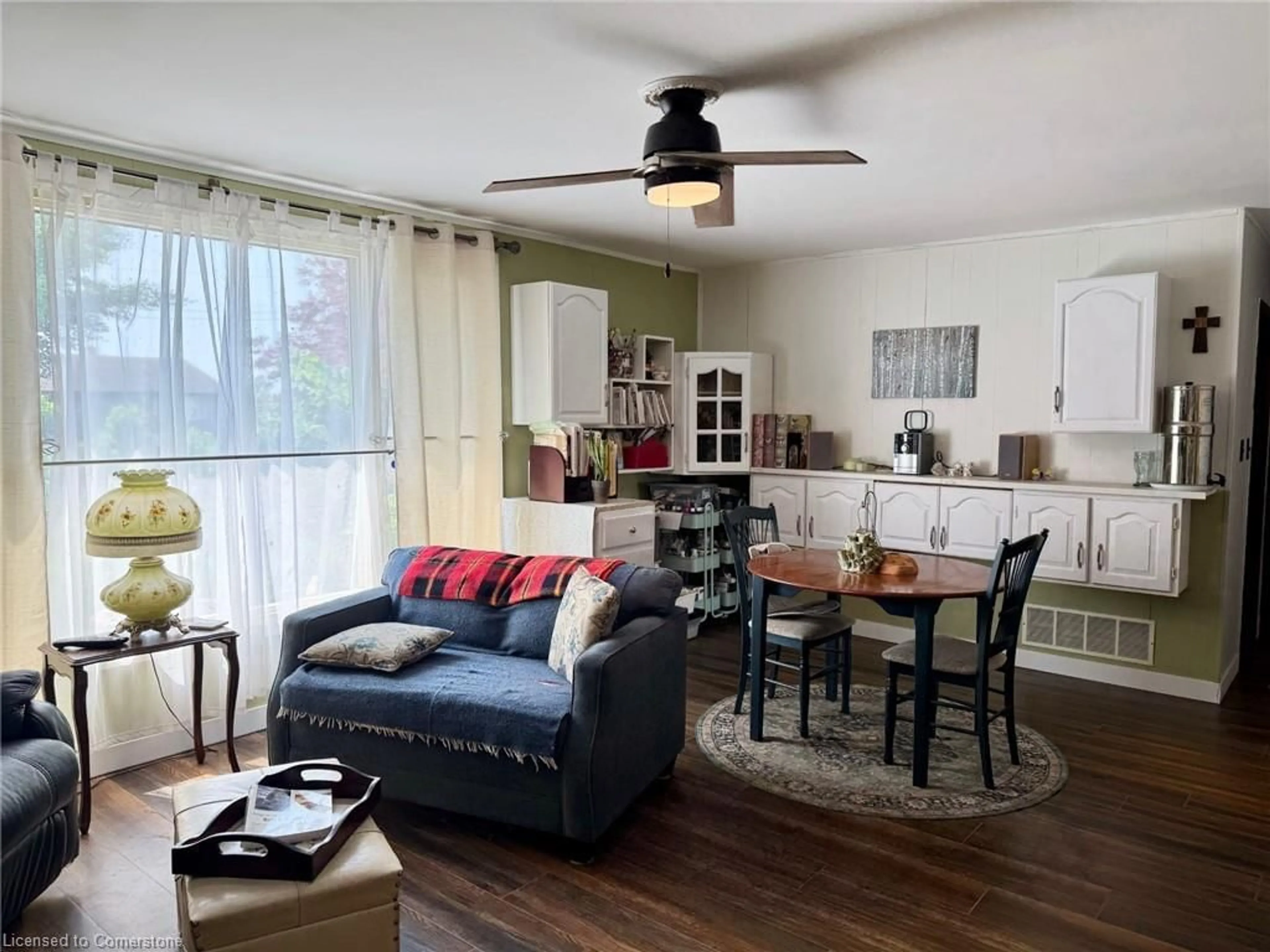 Living room with furniture, wood/laminate floor for 30 Bee St, Booth's Harbour Ontario N0E 1P0