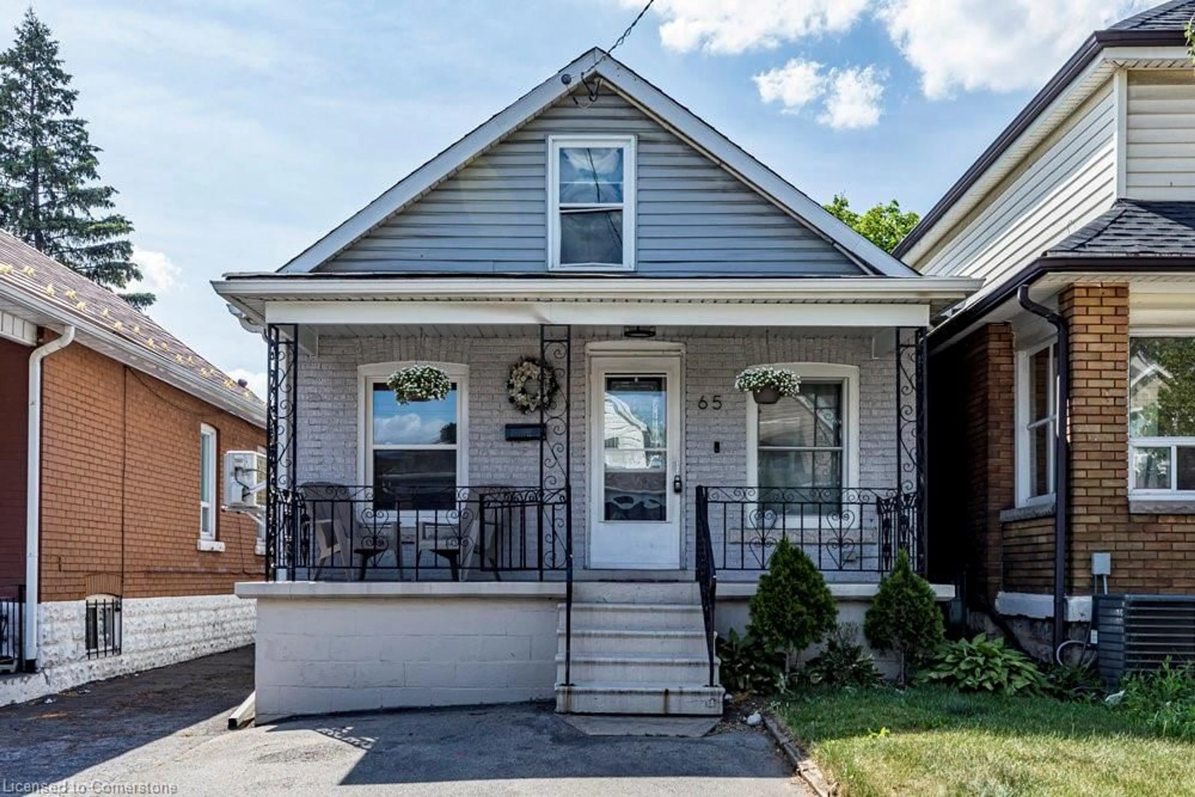 Home with brick exterior material, street for 65 Connaught Ave, Hamilton Ontario L8L 6Y9