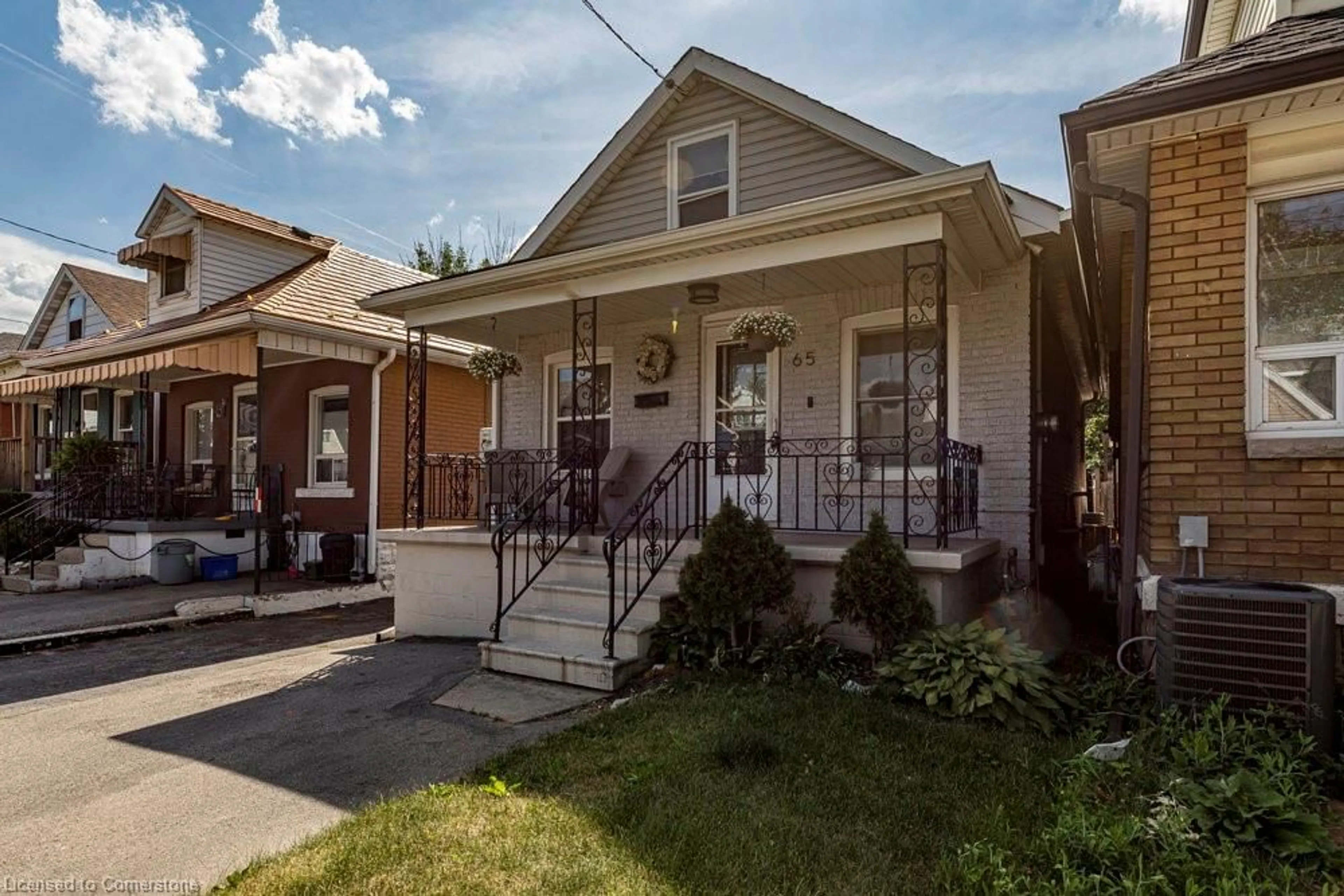 Home with brick exterior material, street for 65 Connaught Ave, Hamilton Ontario L8L 6Y9
