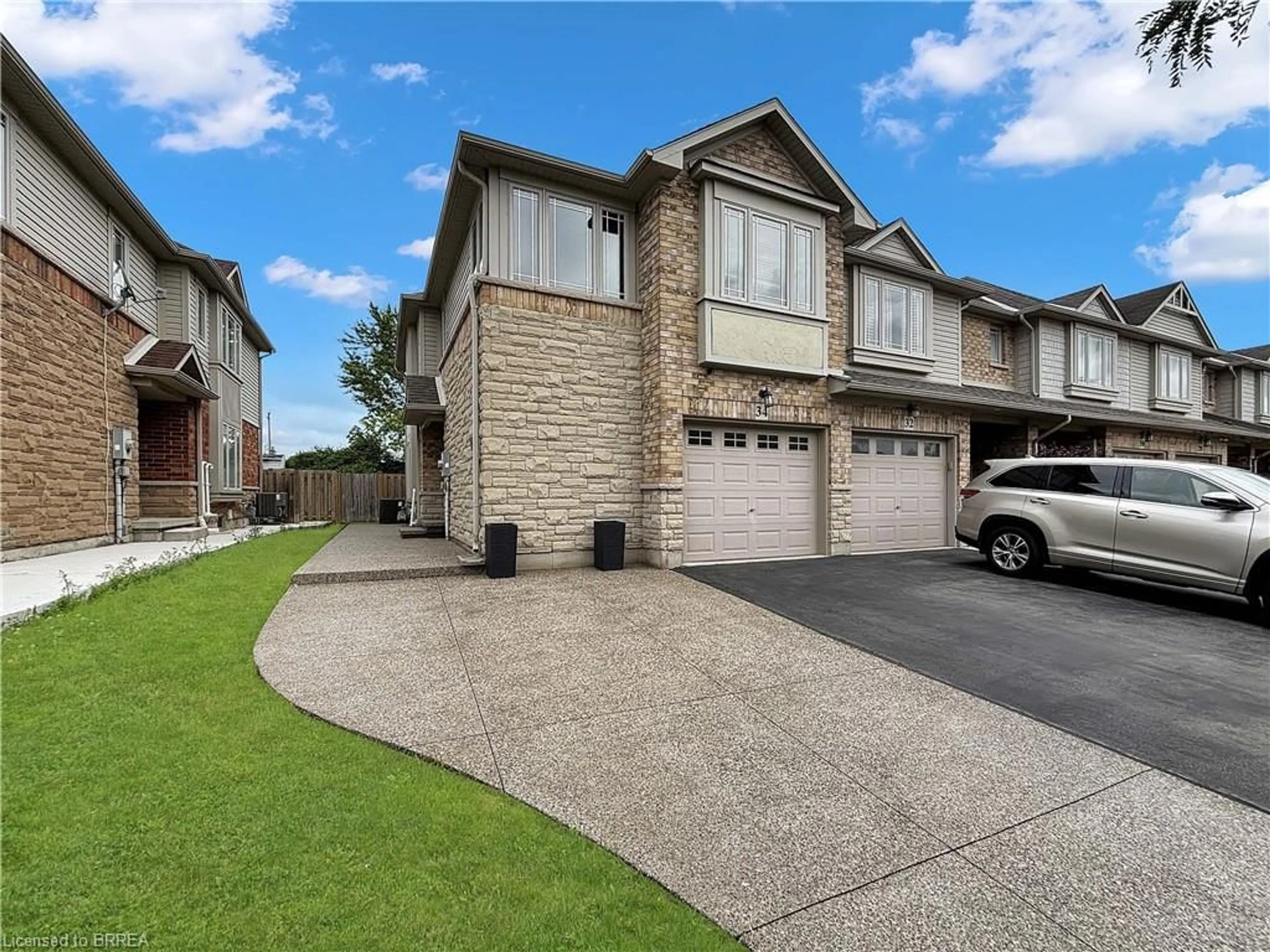 Home with brick exterior material, street for 34 Magnificent Way, Hamilton Ontario L0R 1C0