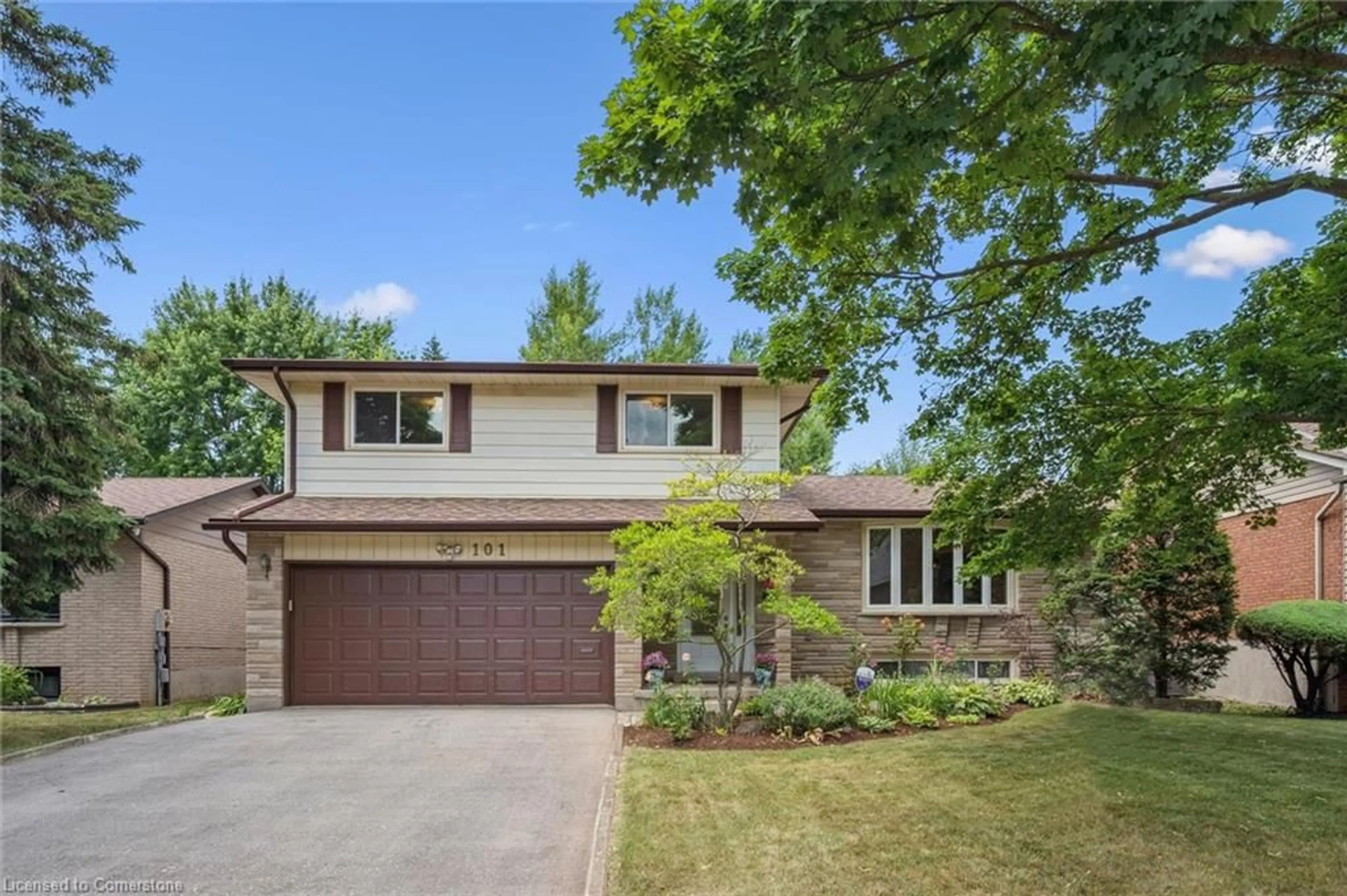 Home with brick exterior material, street for 101 Harvard Rd, Guelph Ontario N1G 2X9