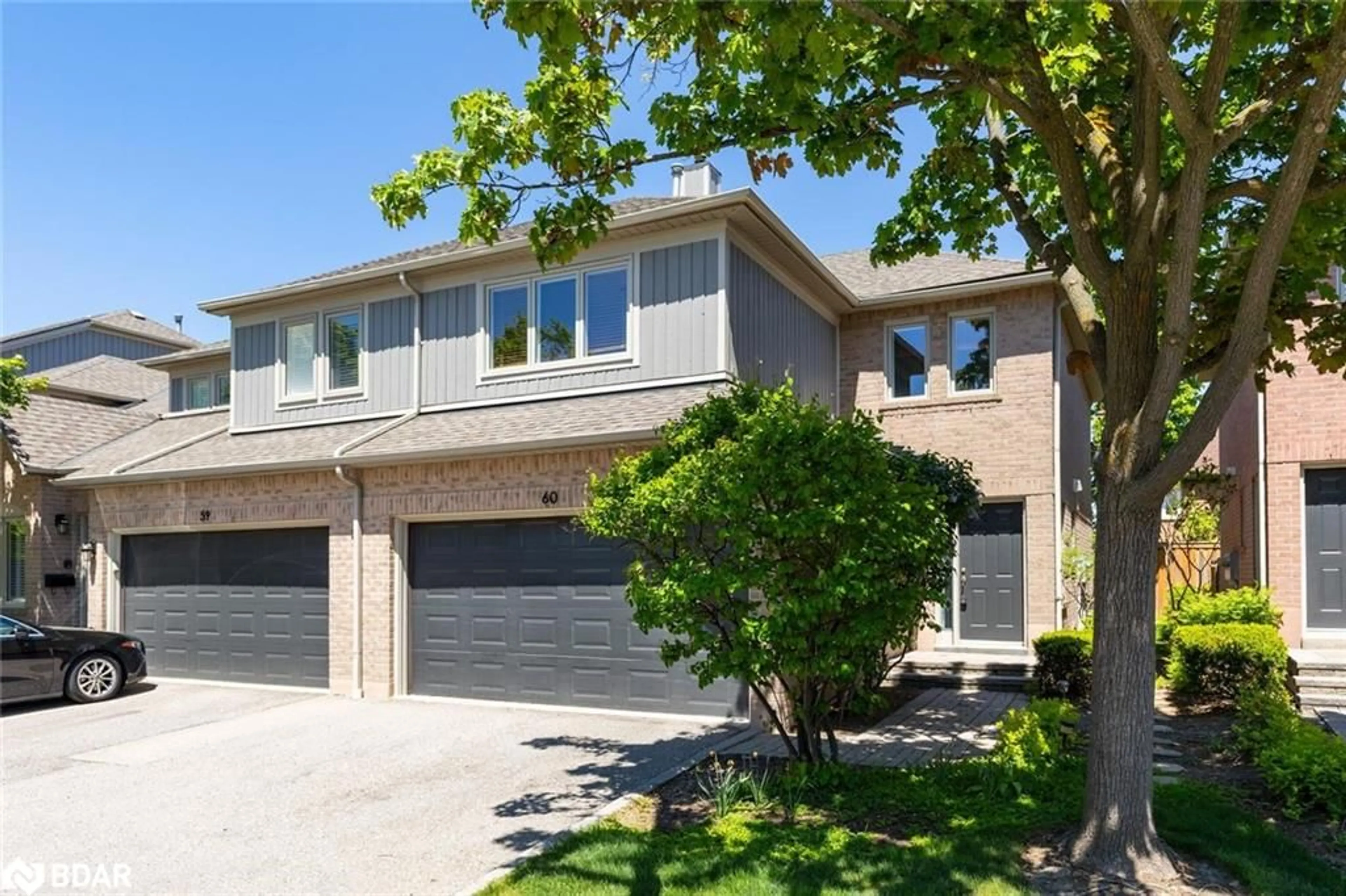 Home with brick exterior material, street for 5480 Glen Erin Dr #60, Mississauga Ontario L5M 5R3