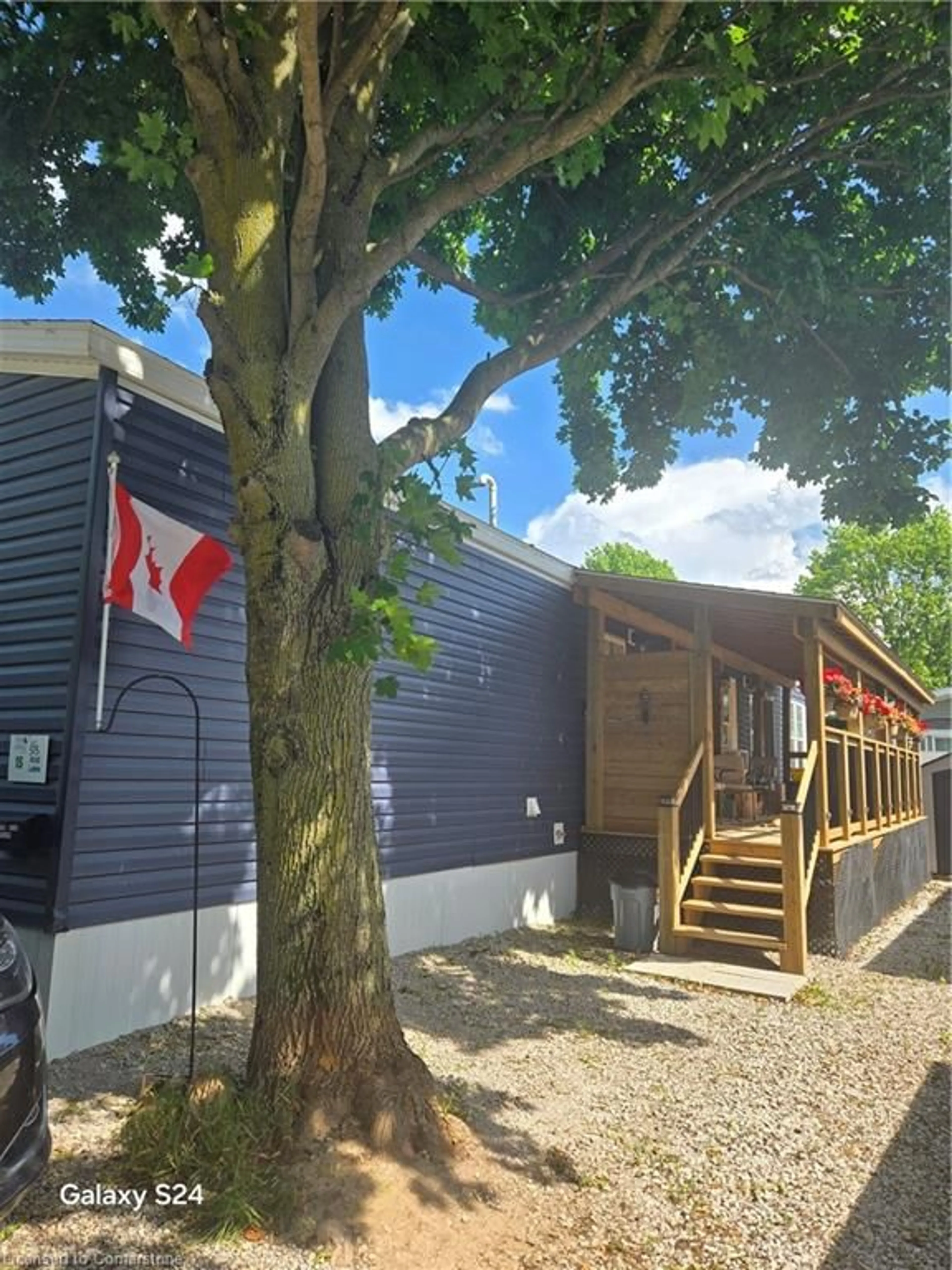 A pic from outside/outdoor area/front of a property/back of a property/a pic from drone, street for 99 Fourth Concession Rd #515 Roselawn, Burford Ontario N0E 1A0