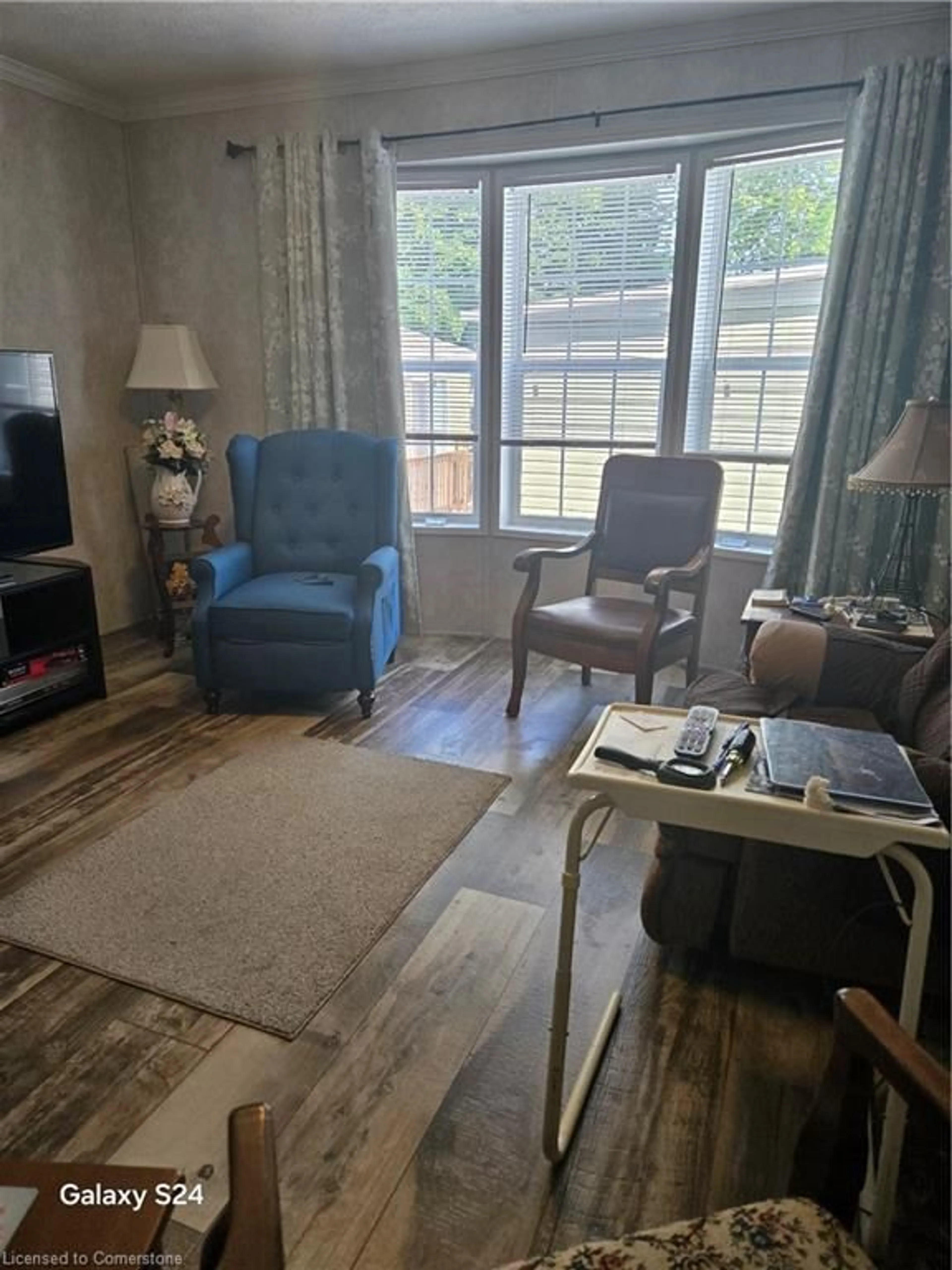 Living room with furniture, unknown for 99 Fourth Concession Rd #515 Roselawn, Burford Ontario N0E 1A0