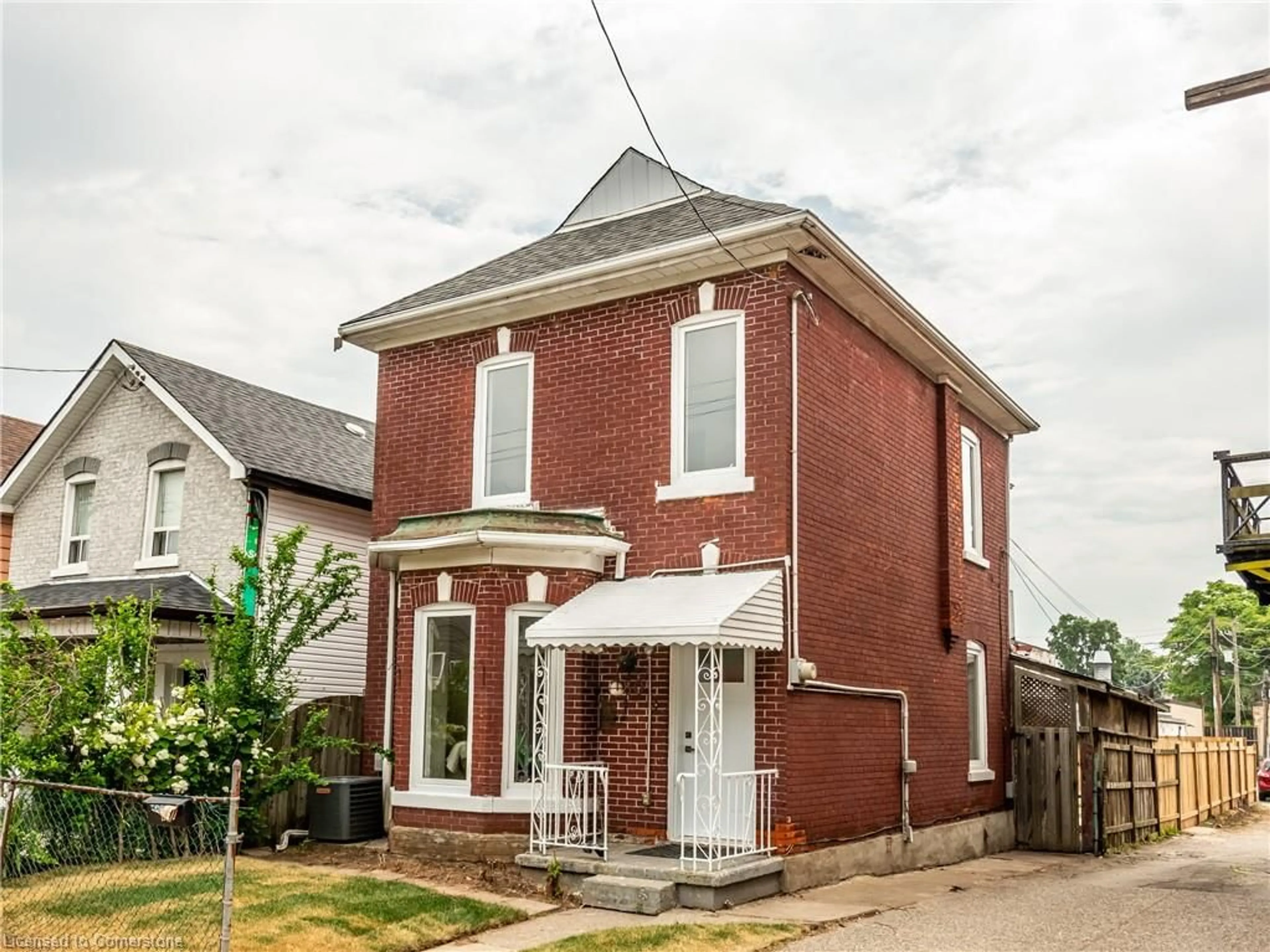 Home with brick exterior material, street for 280 Emerald St, Hamilton Ontario L8L 5L3