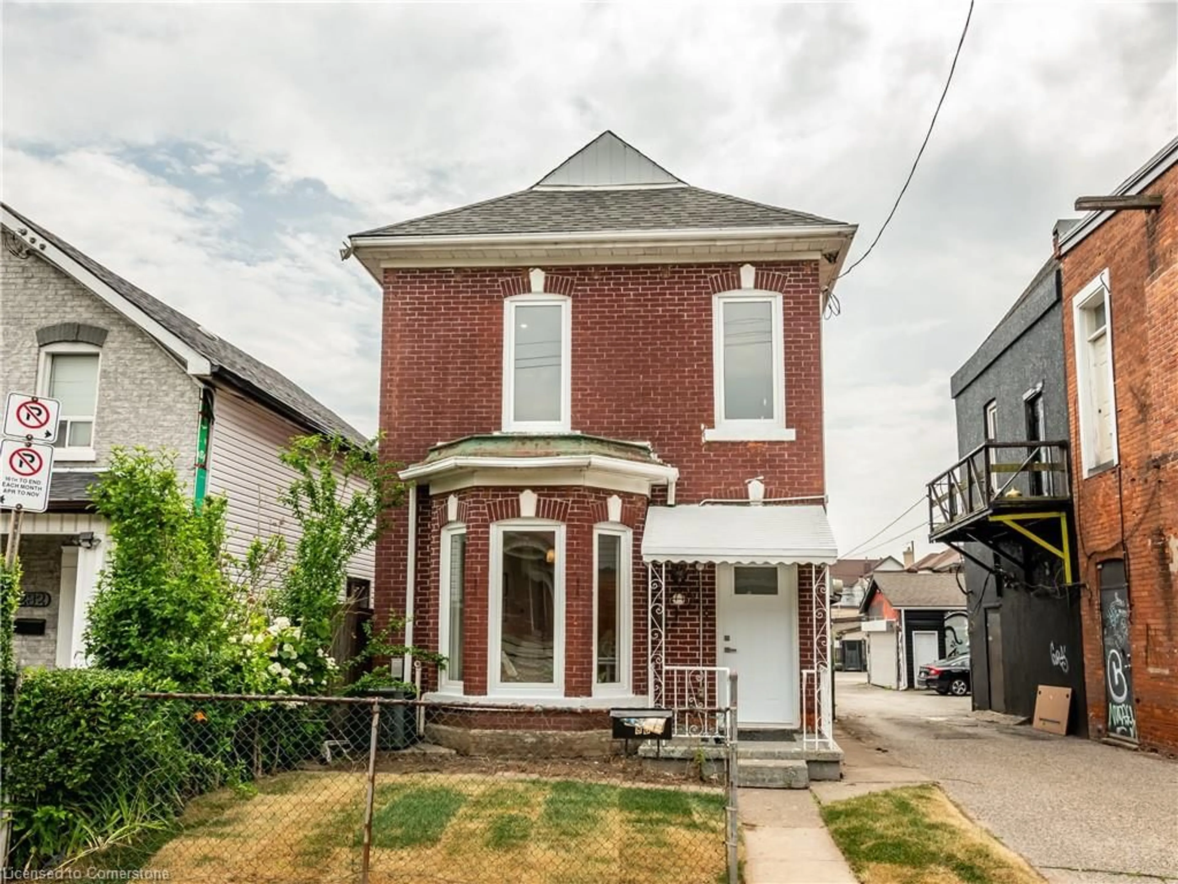 Home with brick exterior material, street for 280 Emerald St, Hamilton Ontario L8L 5L3