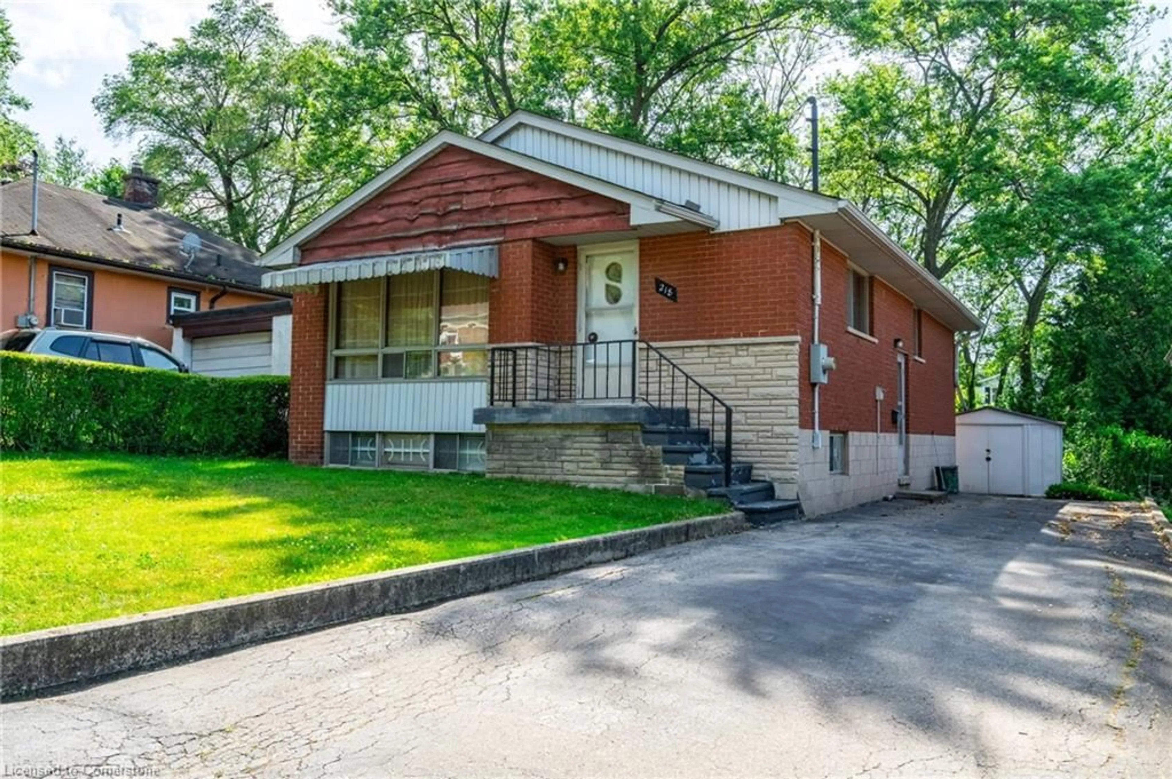 Home with brick exterior material, street for 218 Bowman St, Hamilton Ontario L8S 2V1