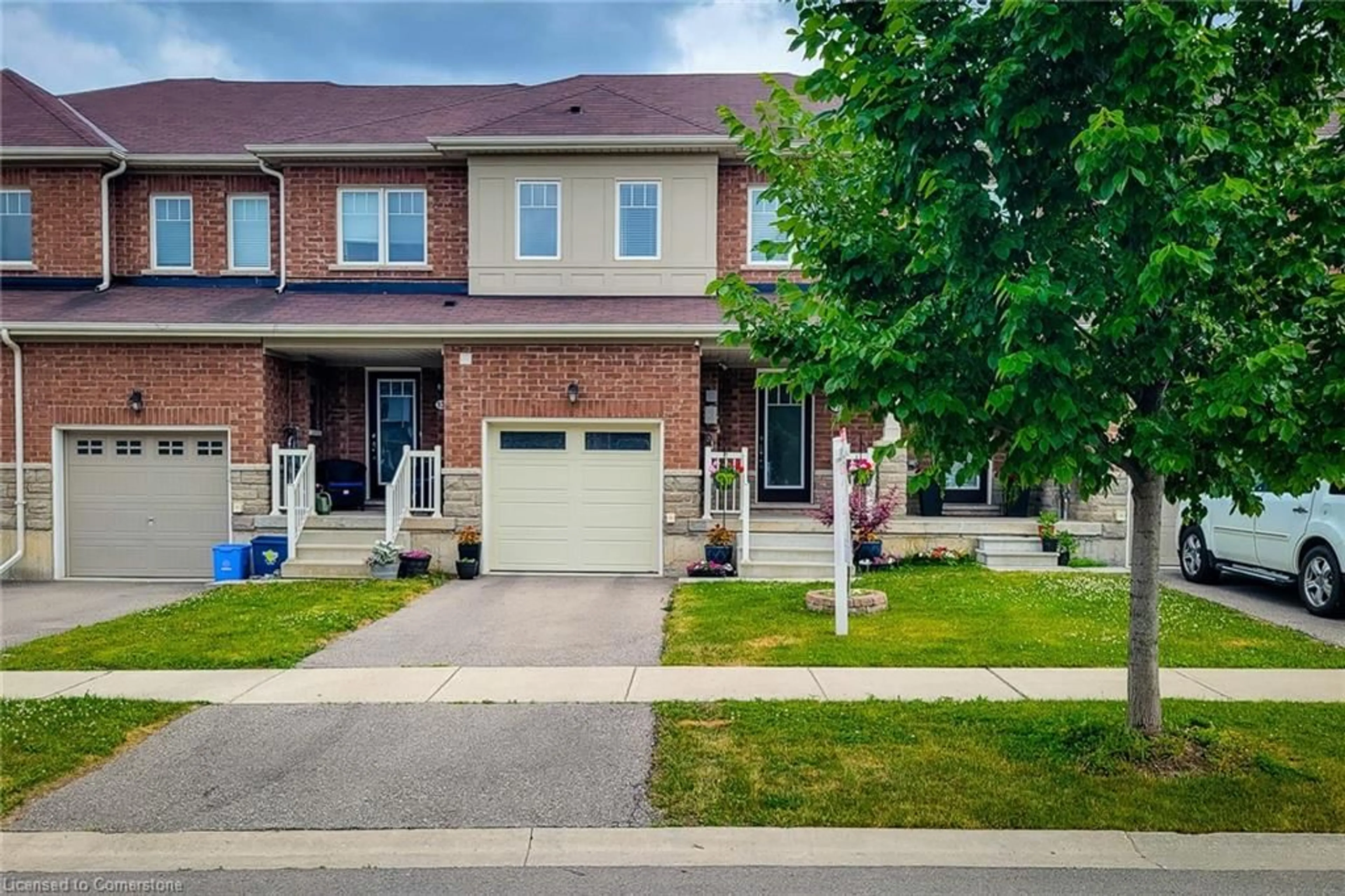 Home with brick exterior material, street for 15 Longboat Run West, Brantford Ontario N3T 0P3
