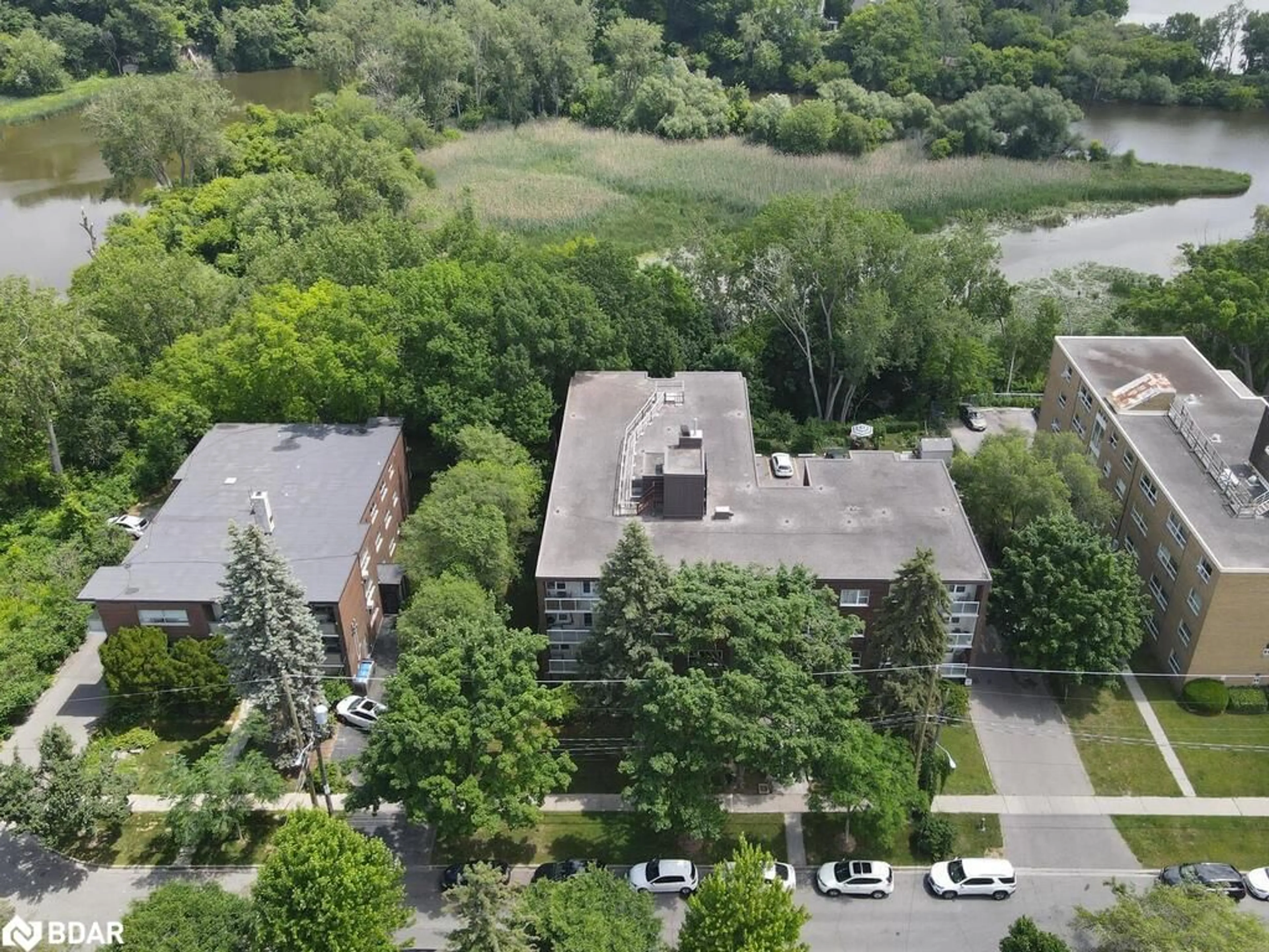 A pic from outside/outdoor area/front of a property/back of a property/a pic from drone, unknown for 185 Stephen Dr, Toronto Ontario M8Y 3N5
