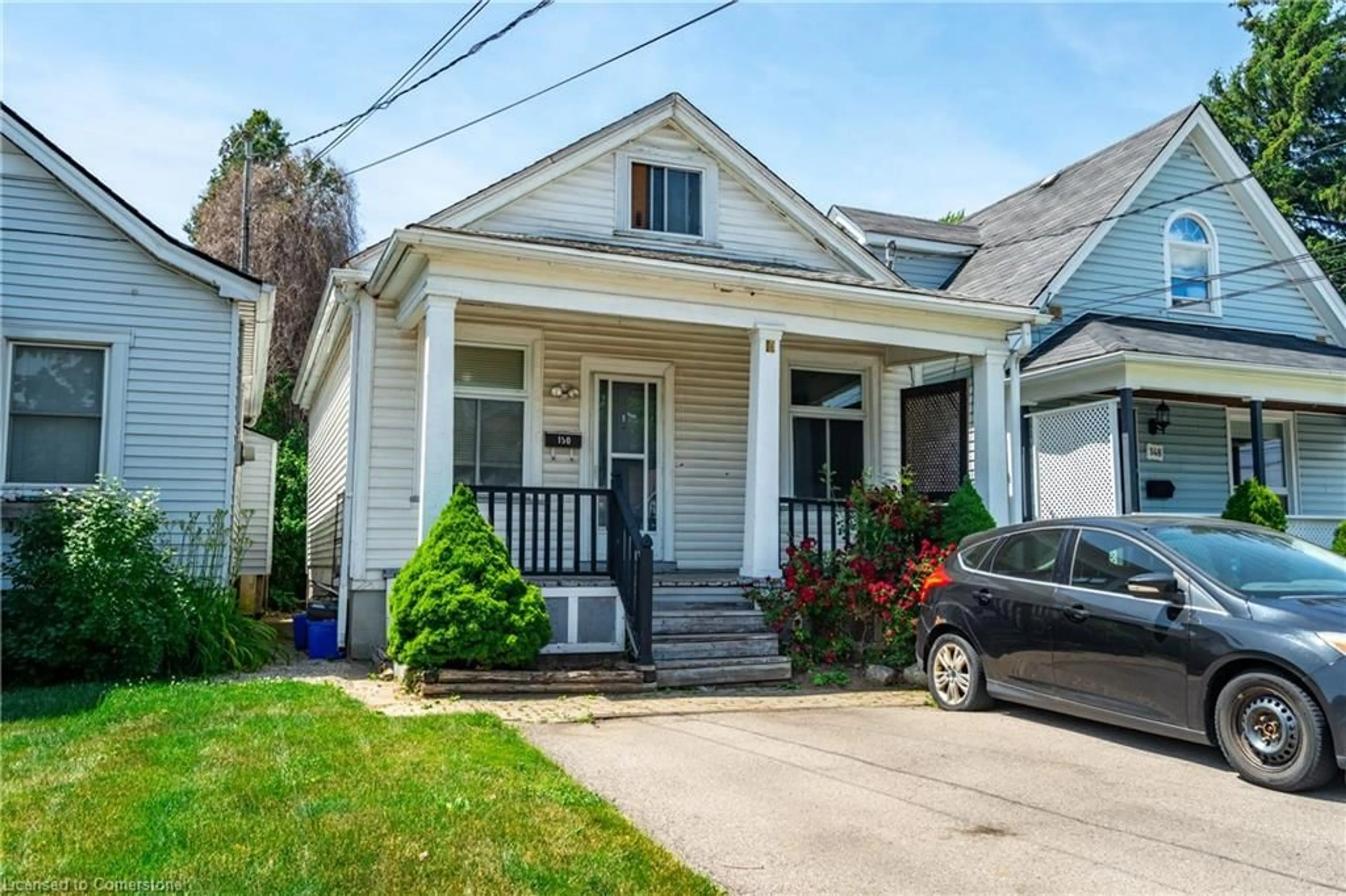 Home with vinyl exterior material, street for 150 East 24th St, Hamilton Ontario L8V 2Y3