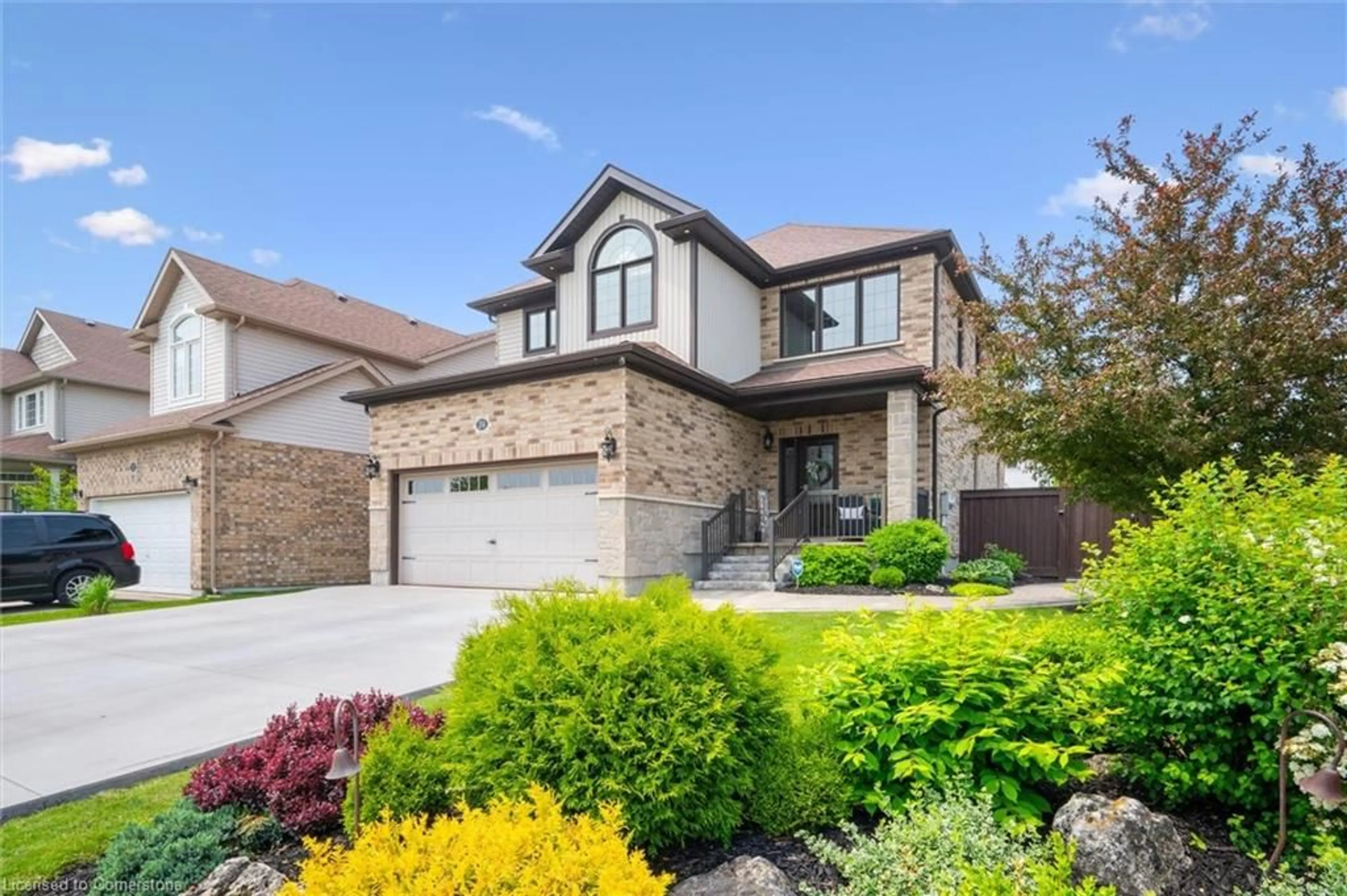 Home with brick exterior material, street for 24 Popham Dr, Guelph Ontario N1E 0B8