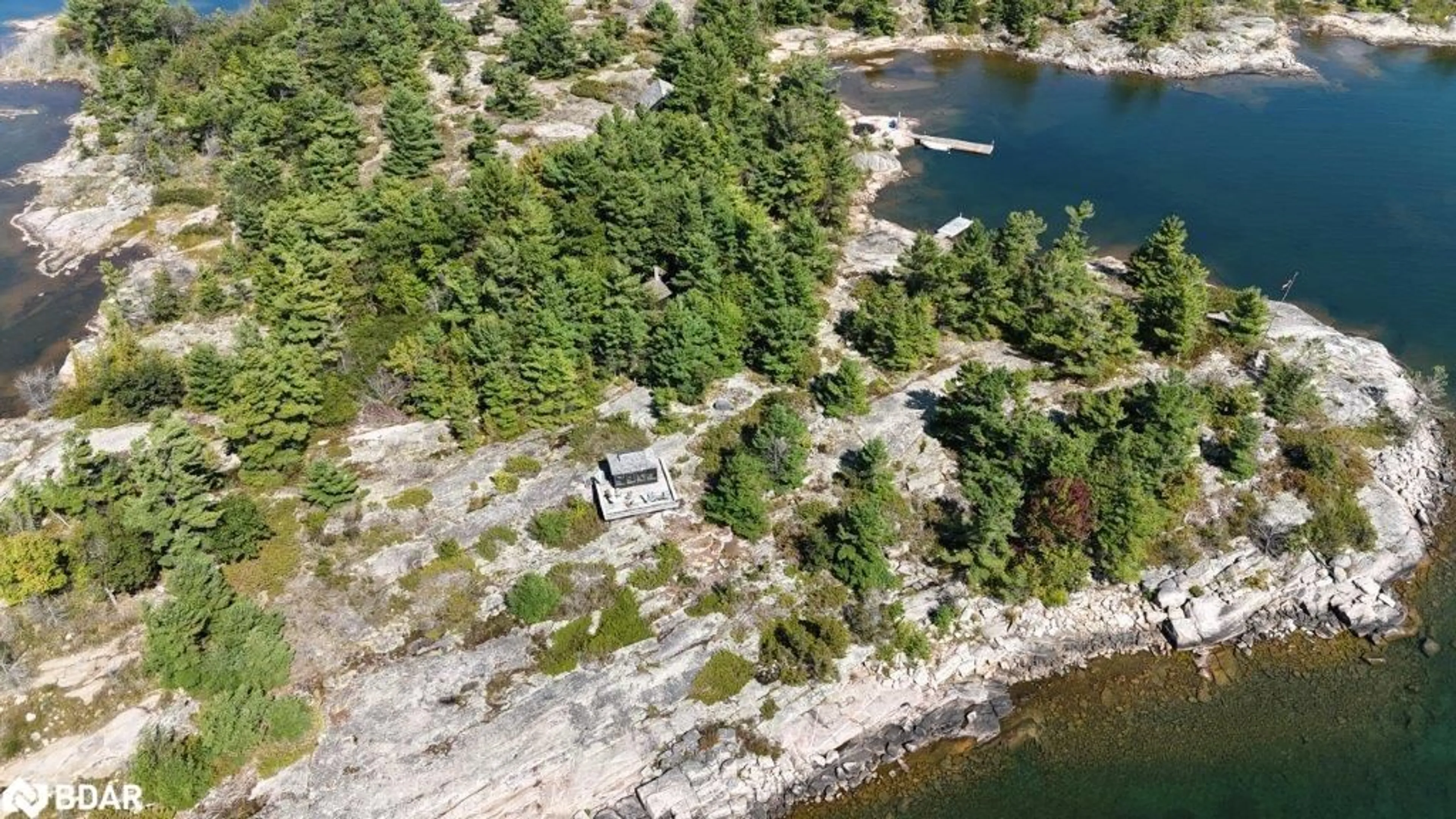 A pic from outside/outdoor area/front of a property/back of a property/a pic from drone, water/lake/river/ocean view for 2 Is 4170 Georgian Bay, Georgian Bay Ontario L0X 1S0